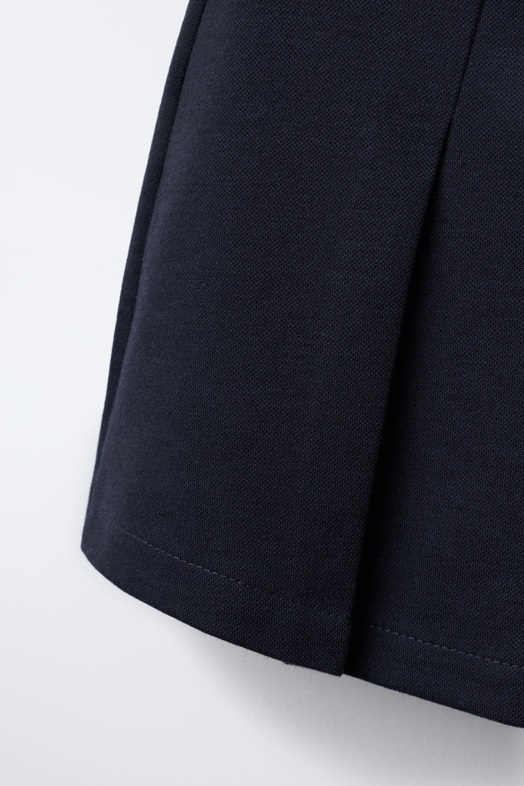 JUPE-SHORT BOUCLE