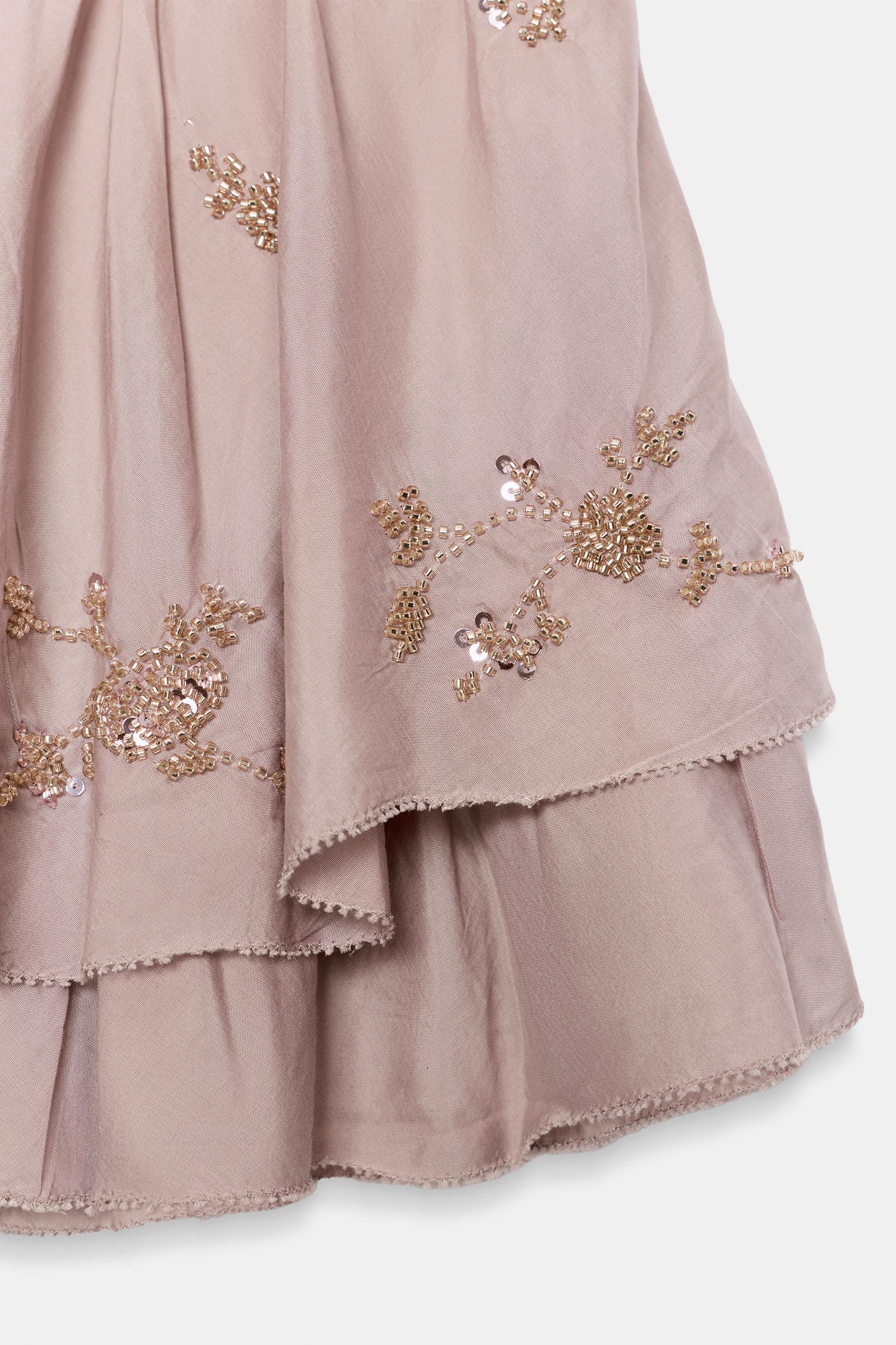 RUFFLED BEADED MINI SKIRT
