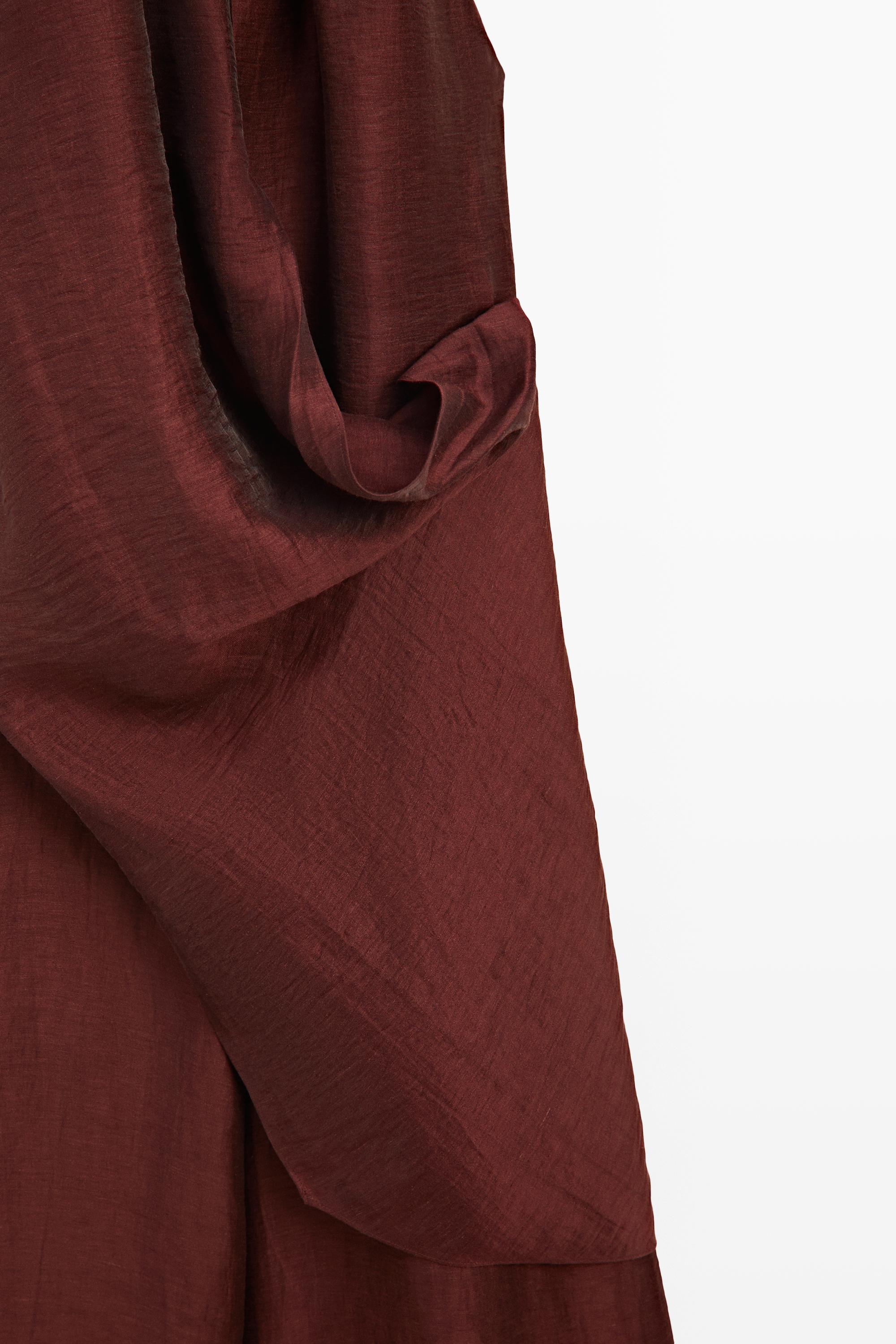Flowing draped halter neck jumpsuit