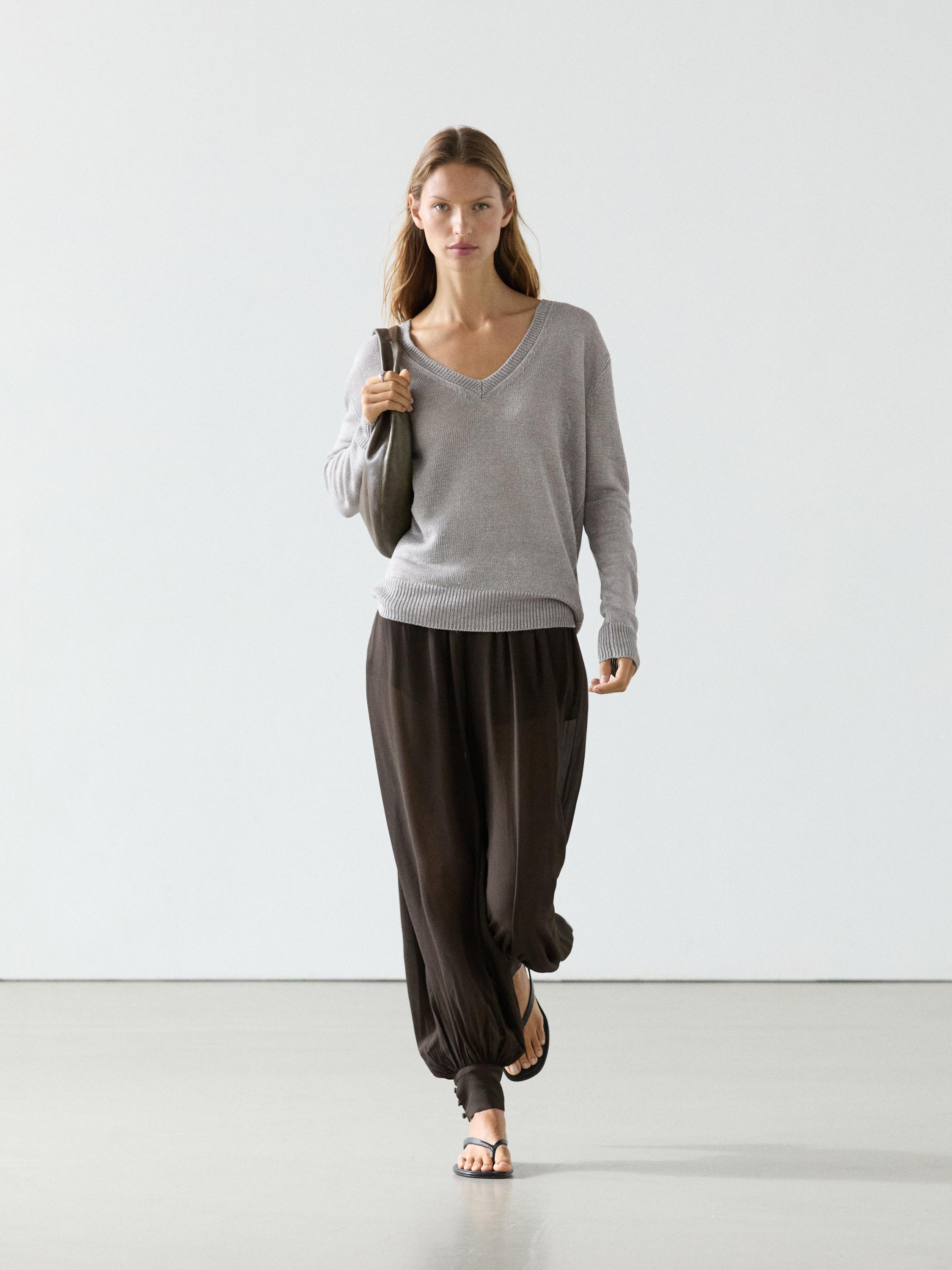 Semi-sheer sarouel trousers with button details