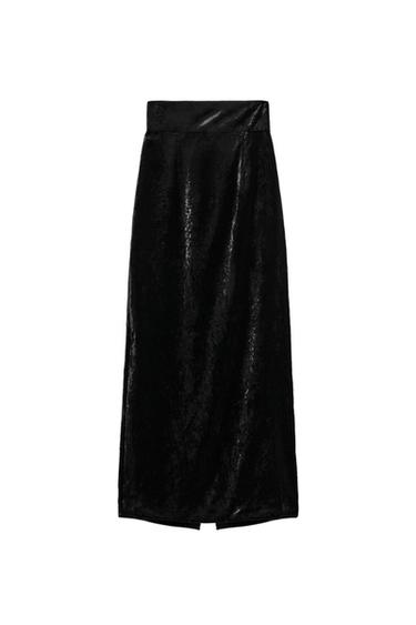 Long black skirt with a shiny texture, high waist, and straight cut. White background.