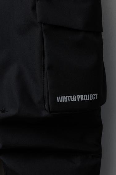 SALOPETTE LONGUE RÉSISTANTE À L'EAU ET AU VENT AVEC POCHES - Noir de Zara - Image 4