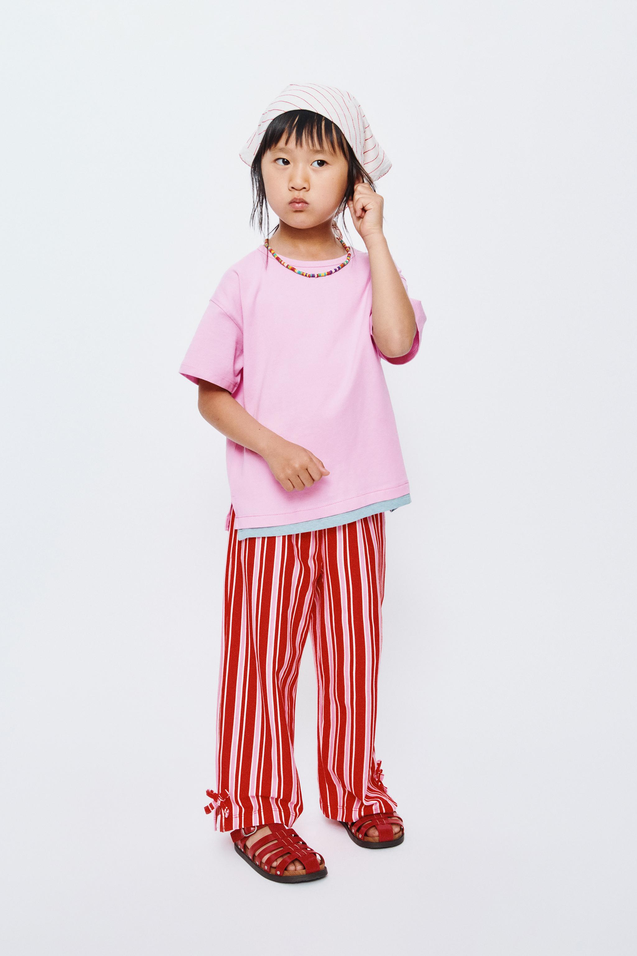 STRIPED TROUSERS WITH BOWS — Bright red