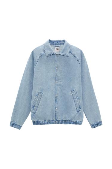 Front view of a light blue jacket with side pockets and front buttons.