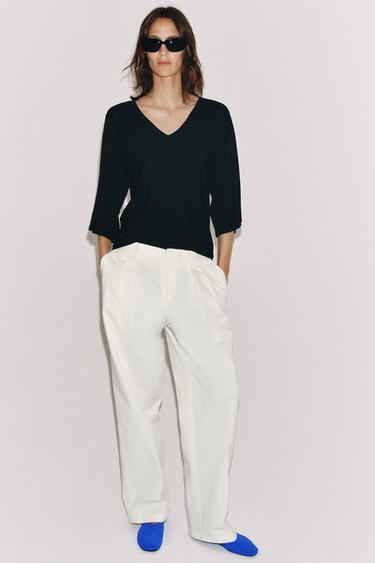 سترة محاكة منسدلة بياقة على شكل V - أسود الخاص بـ Zara