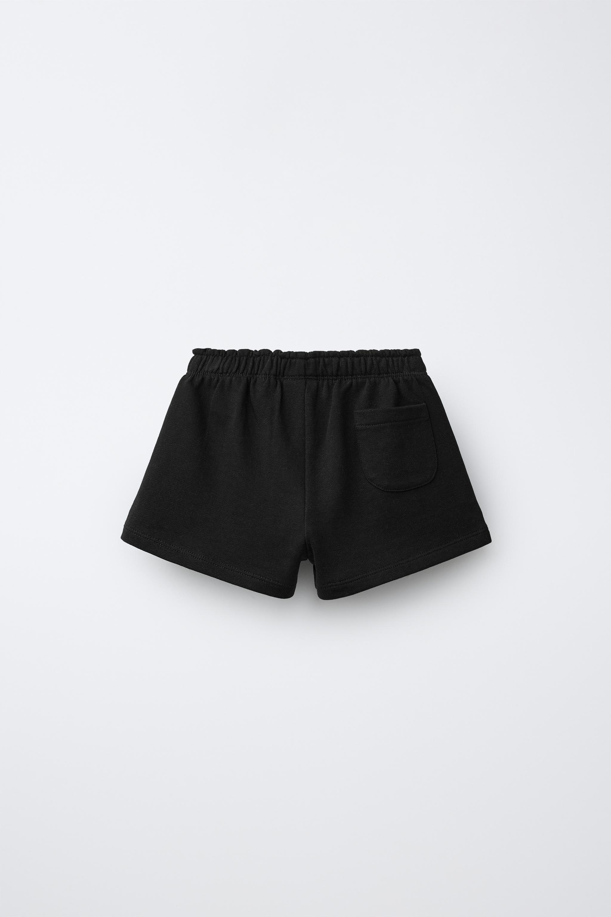 RUBBERIZED APPLIQUÉ PLUSH SHORTS