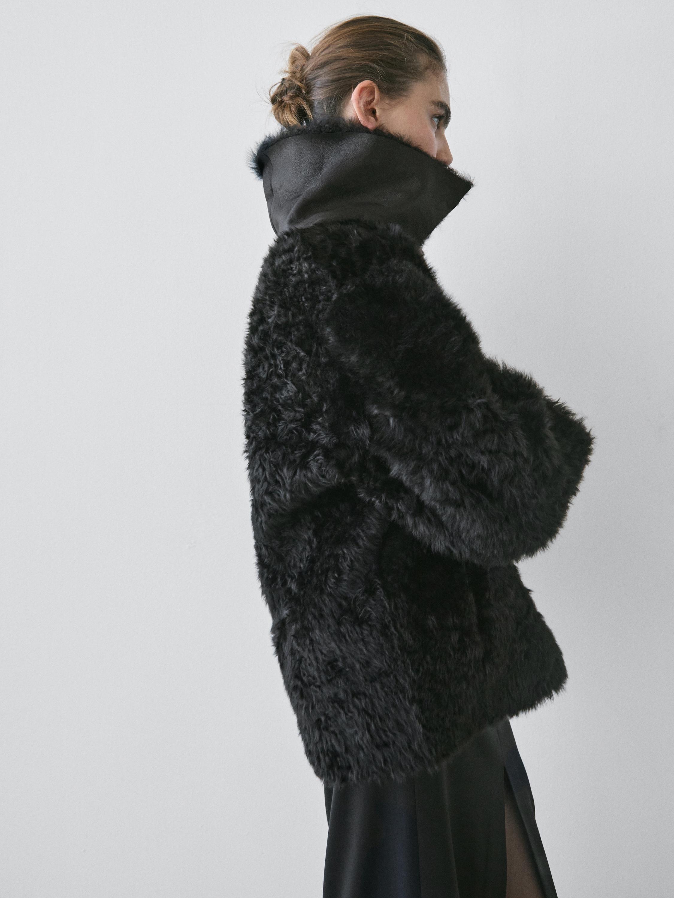 Sheepskin leather coat with lapel collar