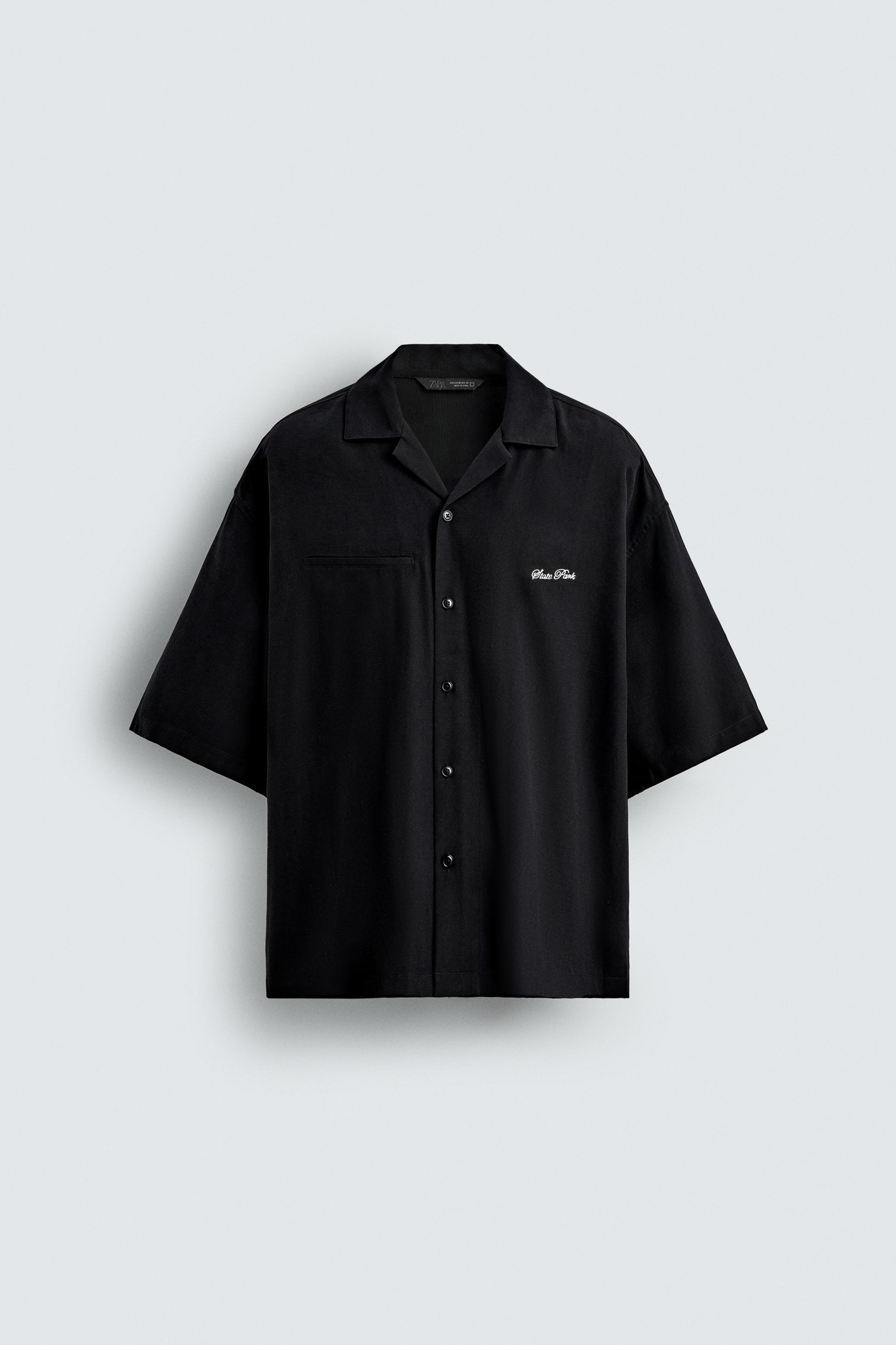 FLOWY SHIRT WITH EMBROIDERED TEXT