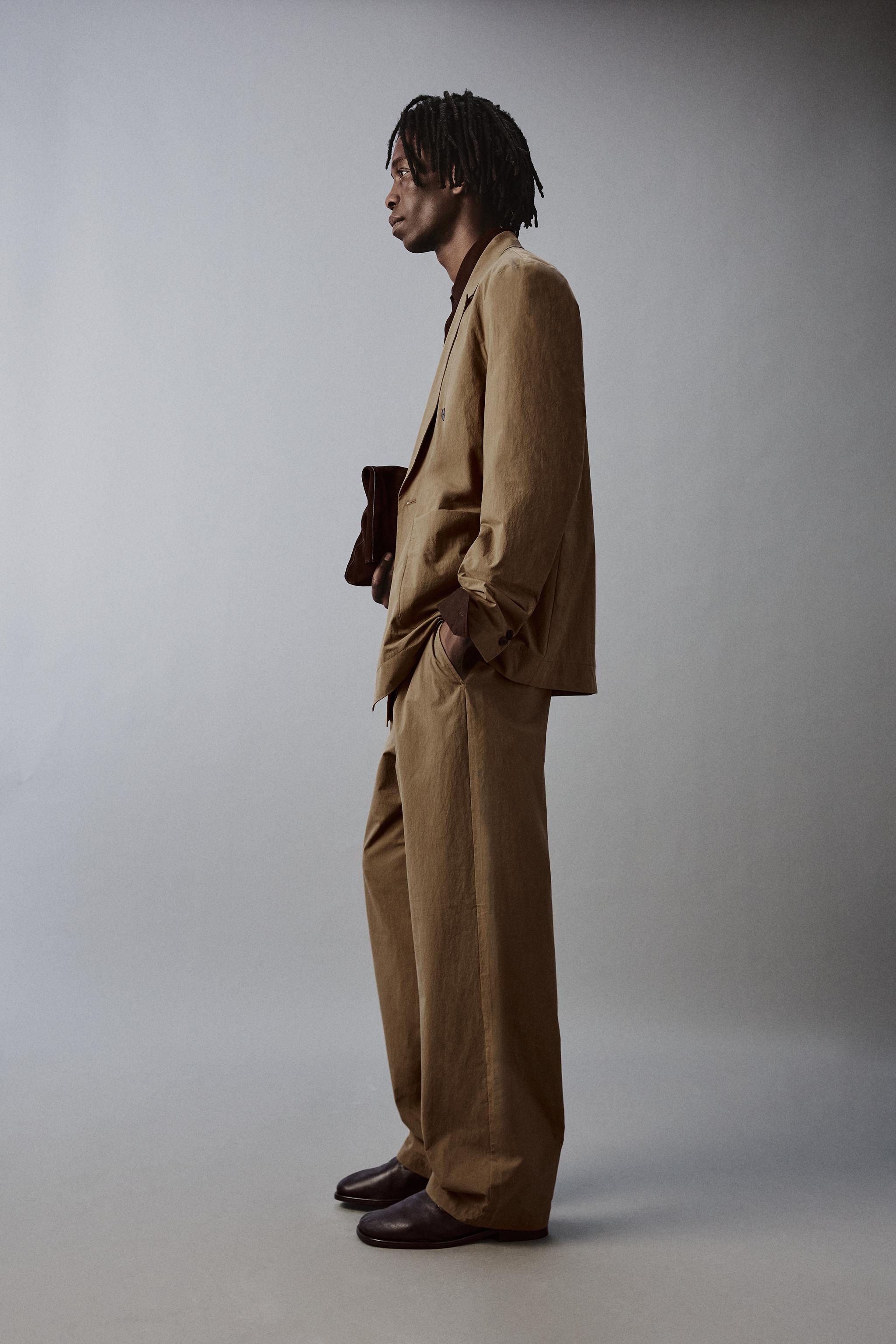 TECHNICAL WIDE FIT SUIT PANTS