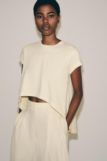 CAMISETA ASIMÉTRICA ALGODÓN - Mantequilla de Zara