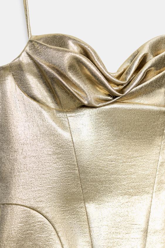 metallic zara dress THREAD KNIT HALTER - Silver The brand has evolved its classic design philosophy to include day dresses and sportswear with its founders still at the helm today Zara Silver/Grey Metallic Long Dress