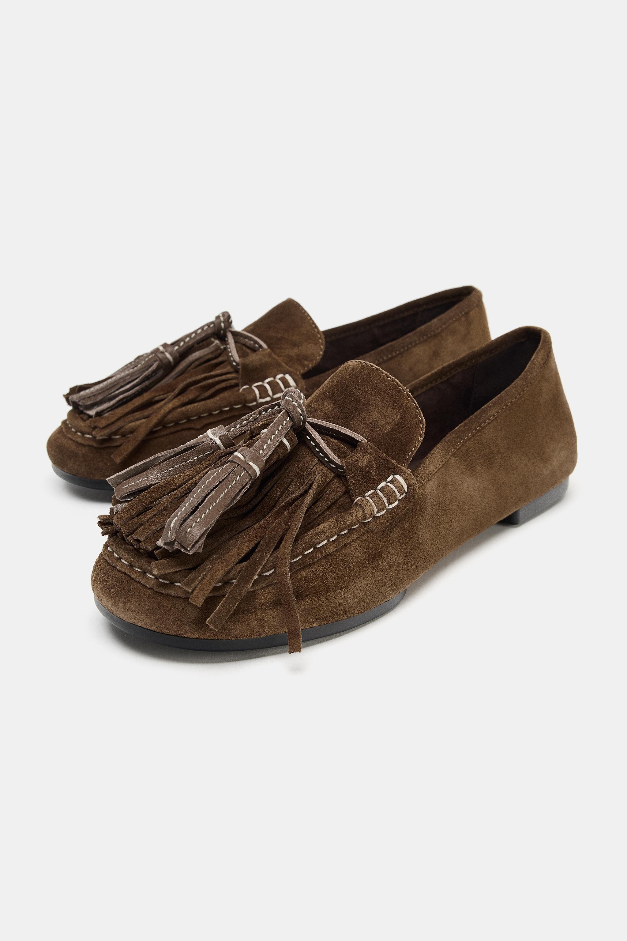 MOCASSINS EN CUIR À POMPONS