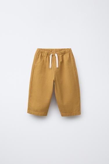 TEXTURED BAGGY TROUSERS - Ochre by Zara - Image 0