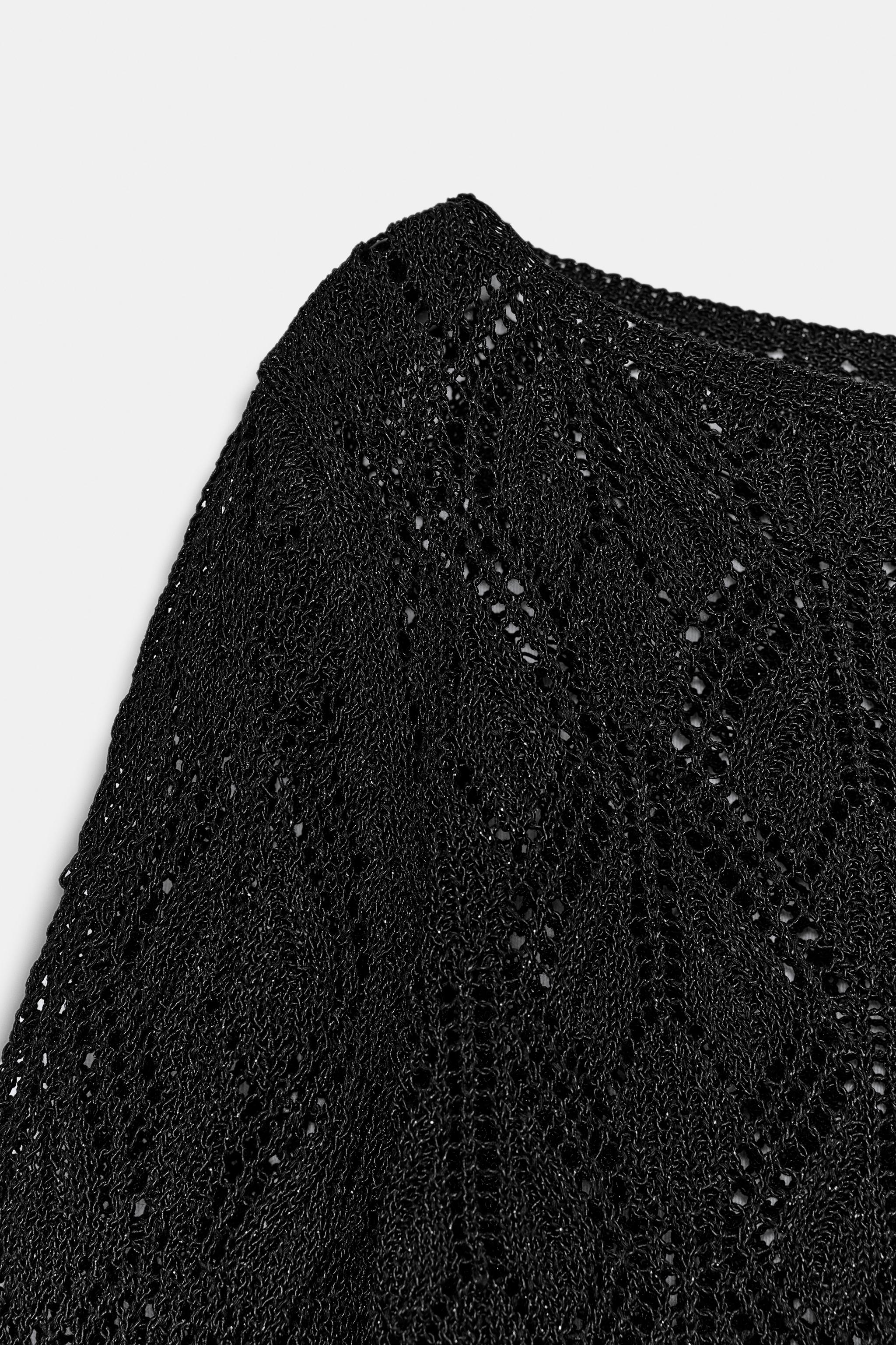 PULL COURT EN MAILLE POINTELLE