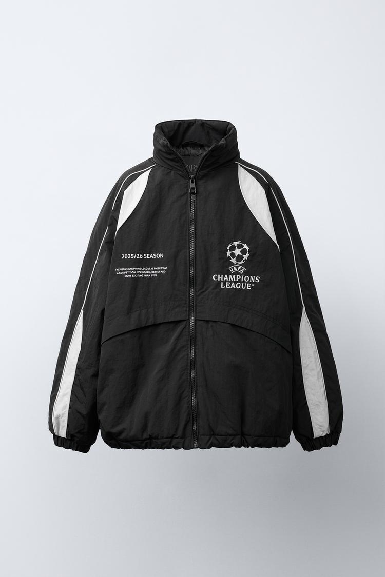 CHAMARRA WATER REPELLENT CAPUCHA UEFA CHAMPIONS LEAGUE ® Negro