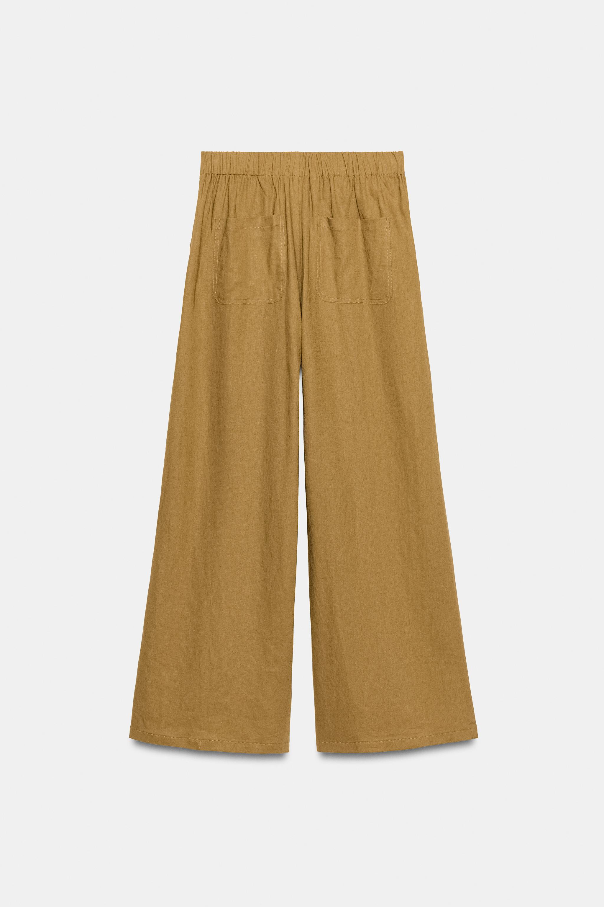 PLEATED WIDE LEG PANTS