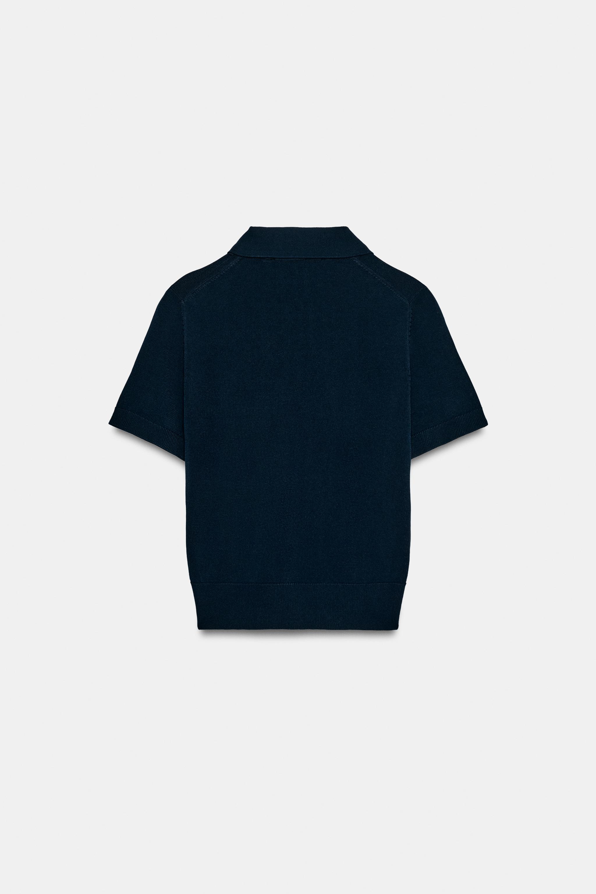 GILET EN MAILLE À MANCHES COURTES