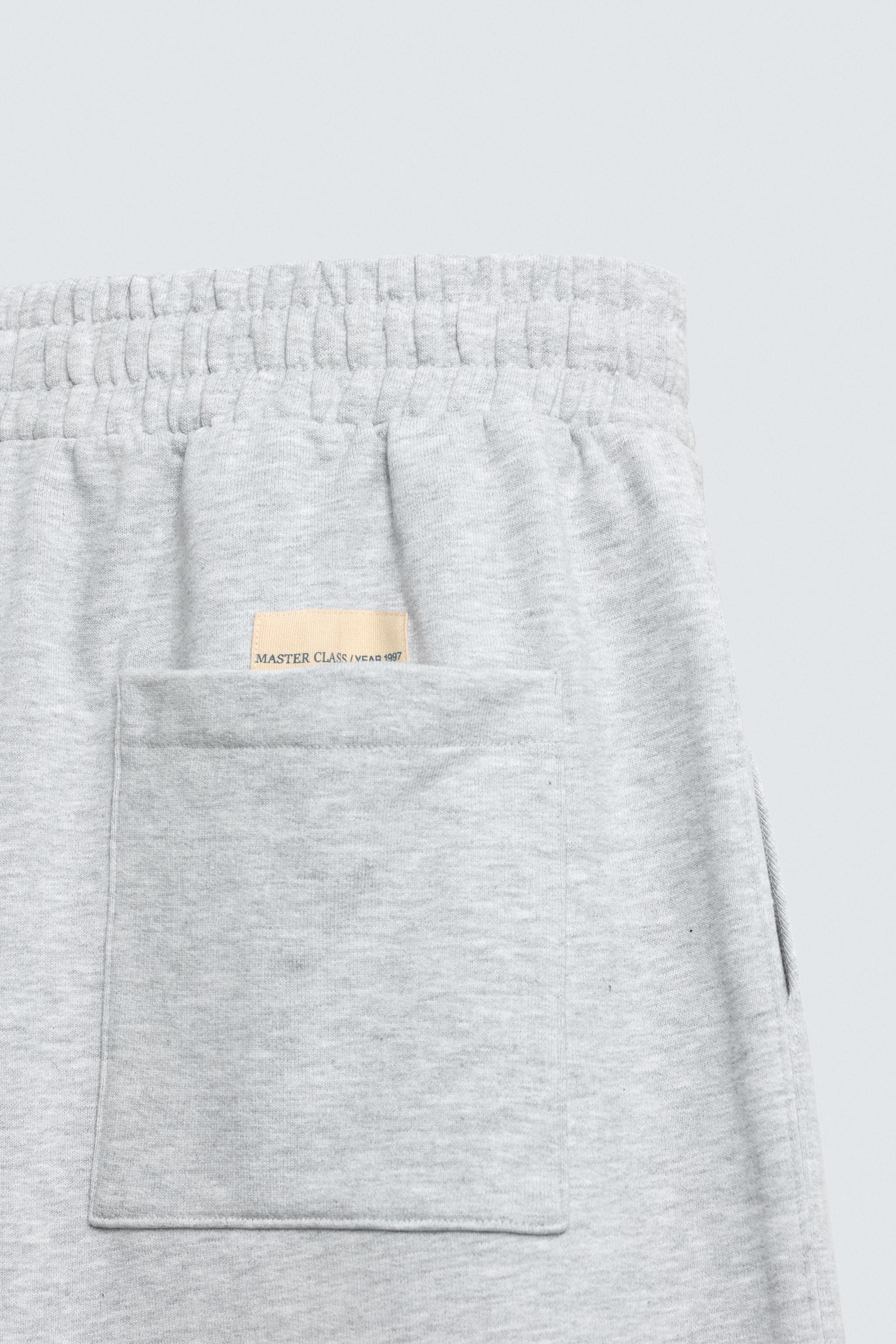 PANTALON DE JOGGING COUPE BALLON AVEC PIÈCE