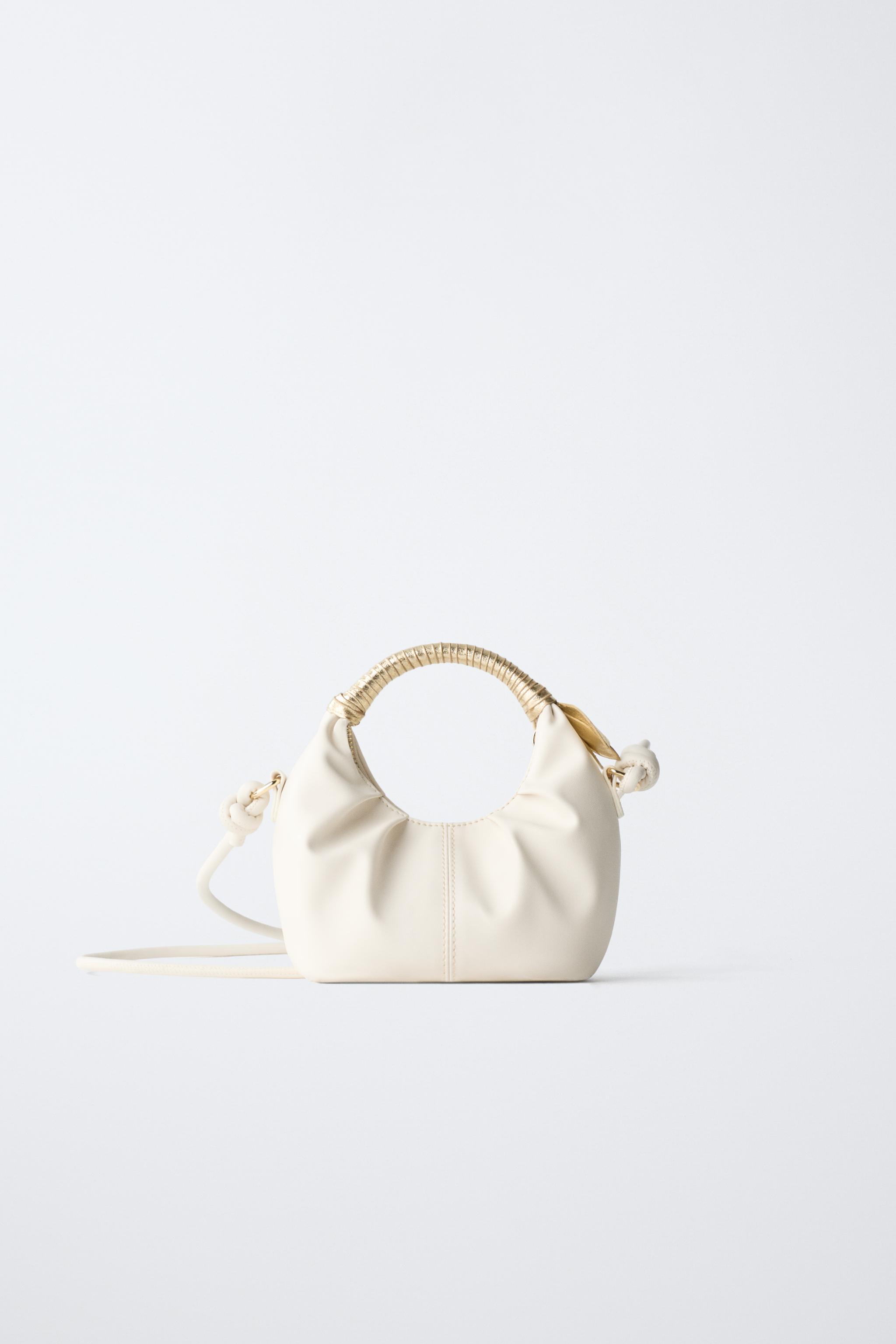 CROSSBODY BAG WITH FLORAL DETAIL