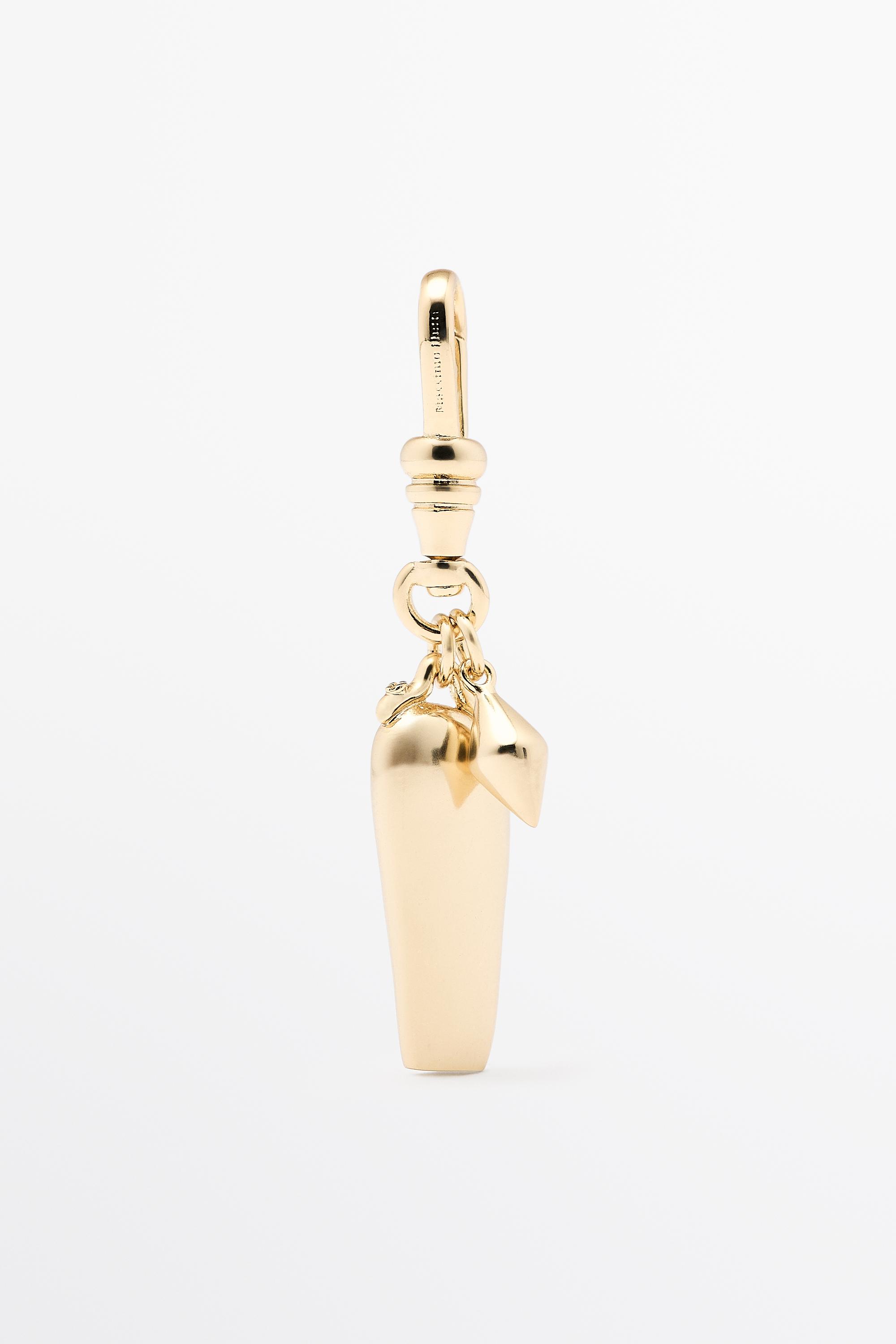 Elongated charm pendant — Golden