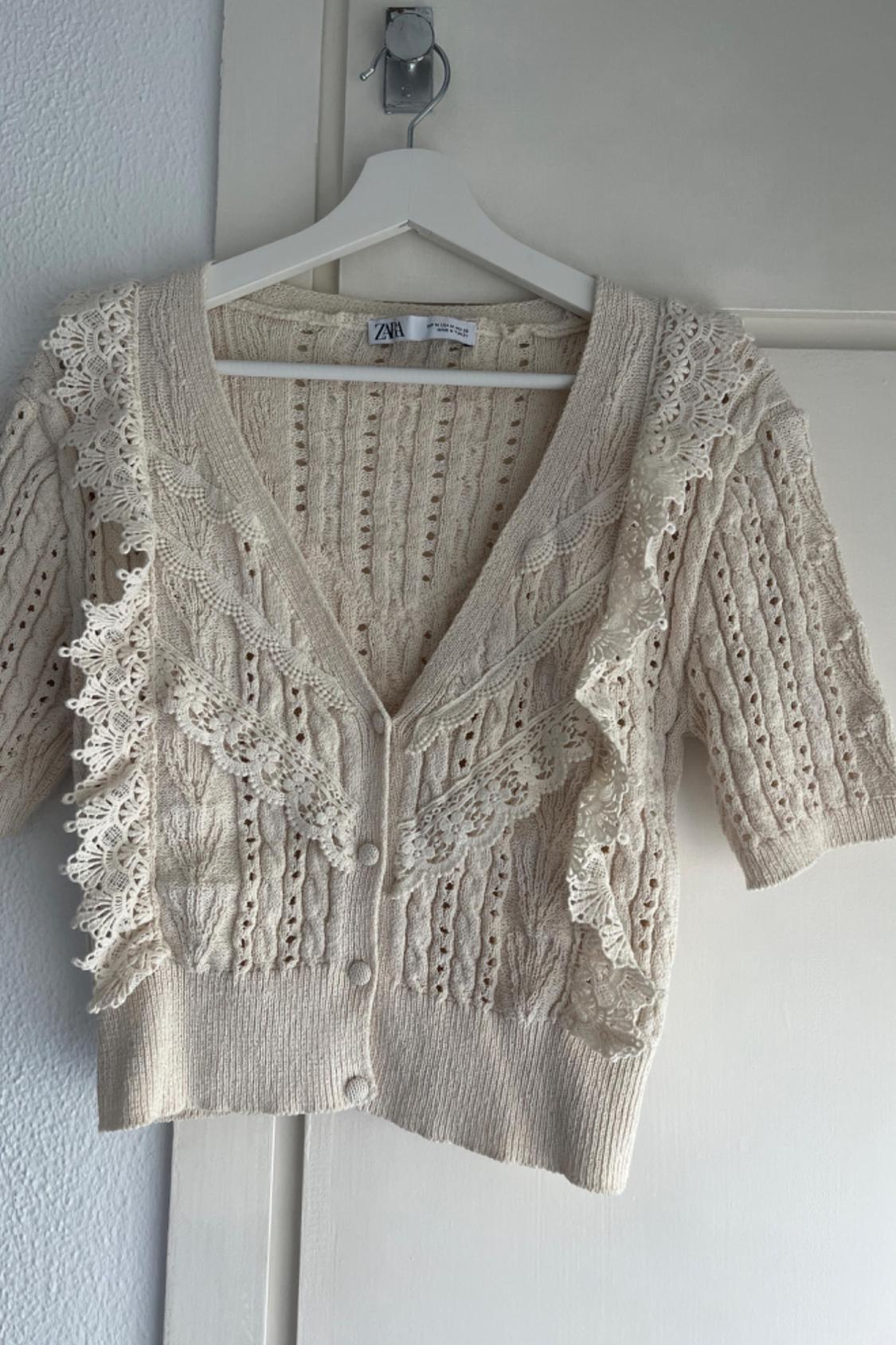 POINTELLE RUFFLED KNIT CARDIGAN
