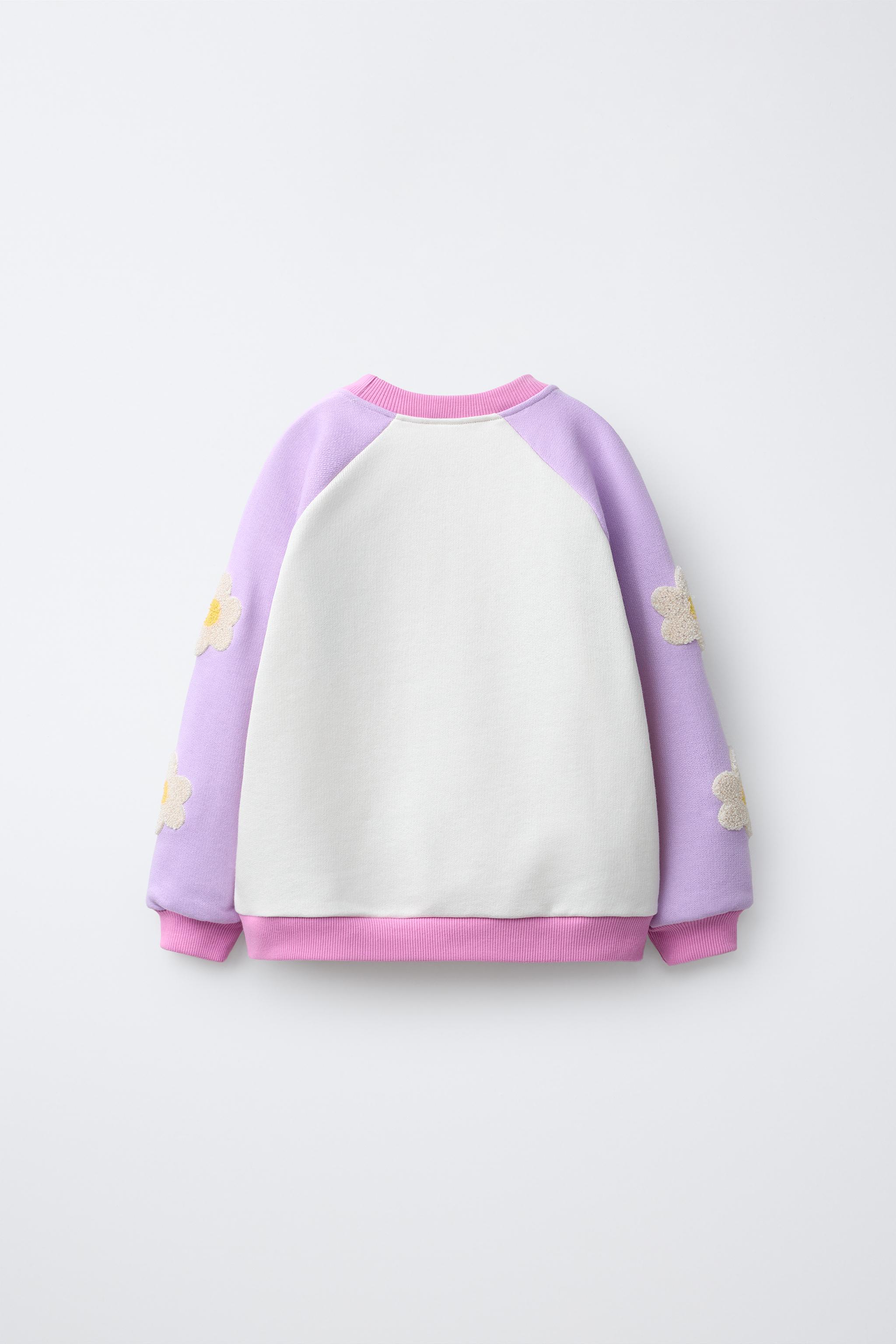 CONTRASTING SLEEVE FLORAL SWEATSHIRT