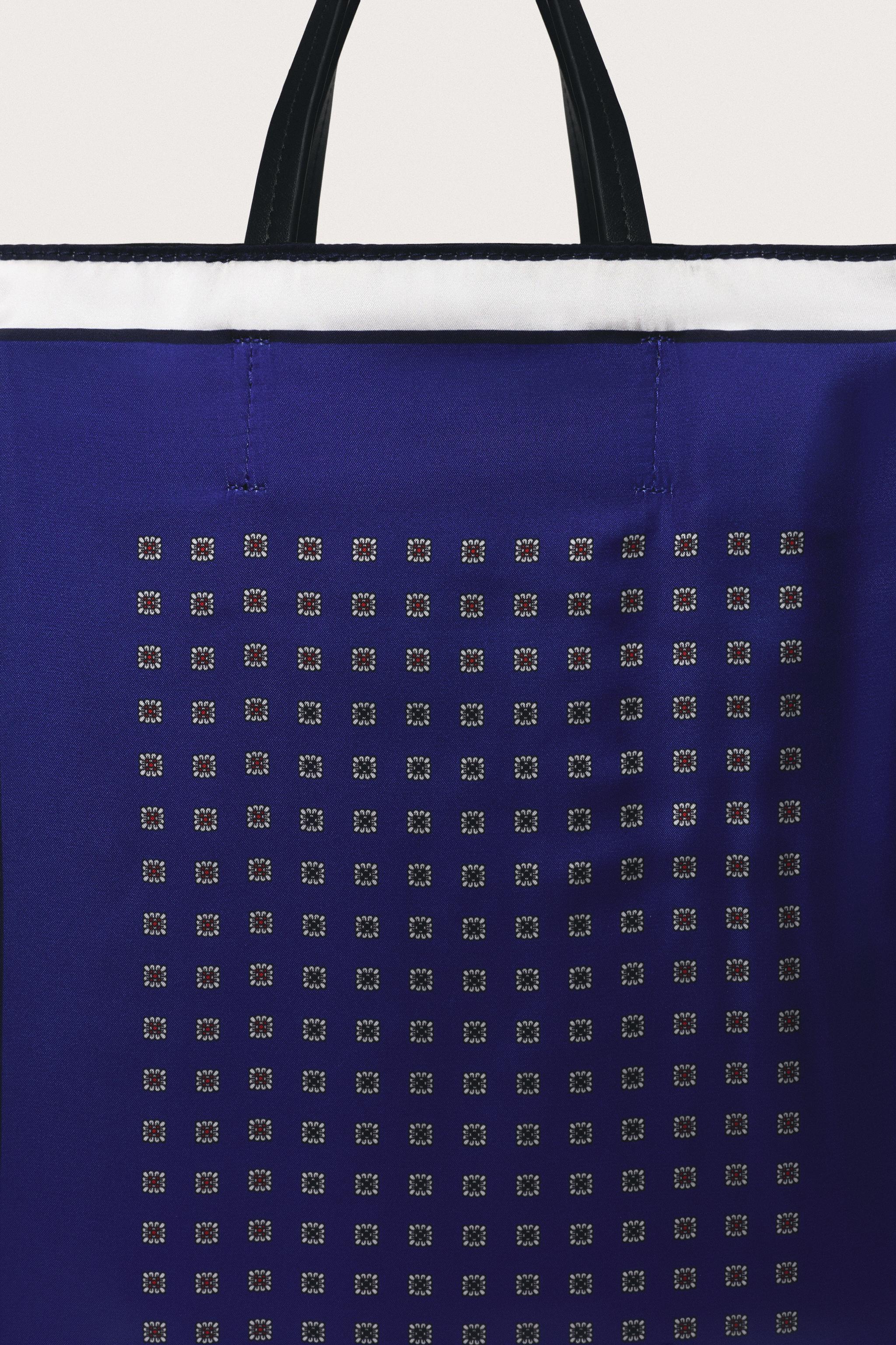 LIMITED EDITION LEATHER DETAIL HANDBAG