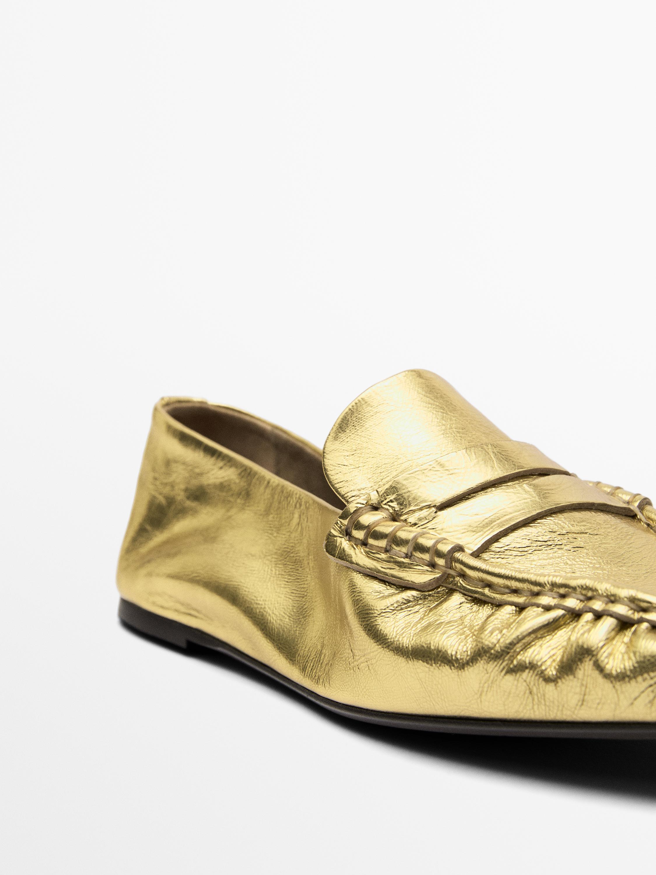 Mocassins dorés avec patte