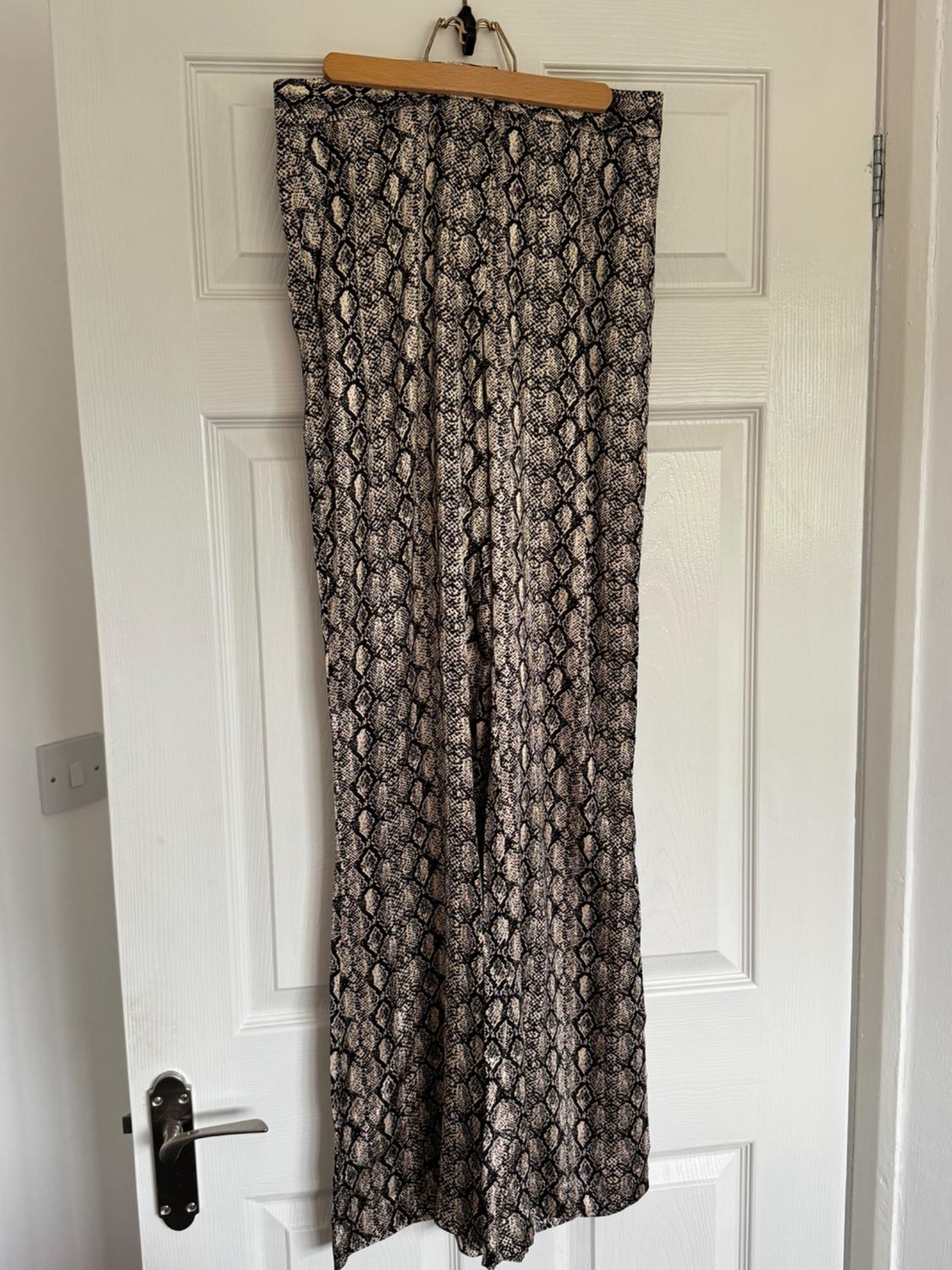 ANIMAL PRINT FLARED TROUSERS - Image 2