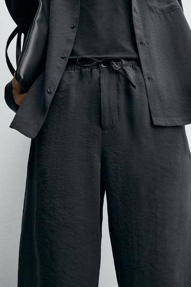 RELAXED FIT FLOWING TROUSERS - Black by Zara