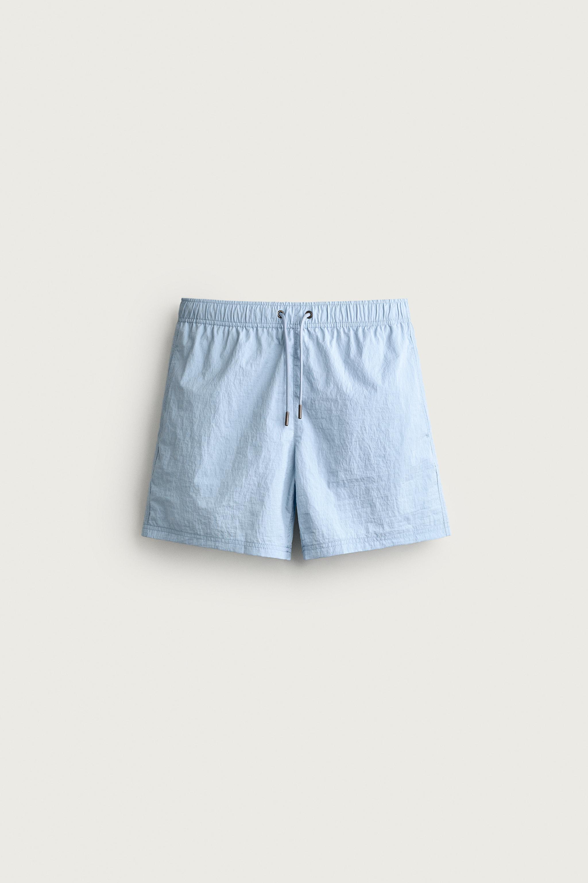 STRIPED MID-LENGTH SWIMSUIT — Sky blue