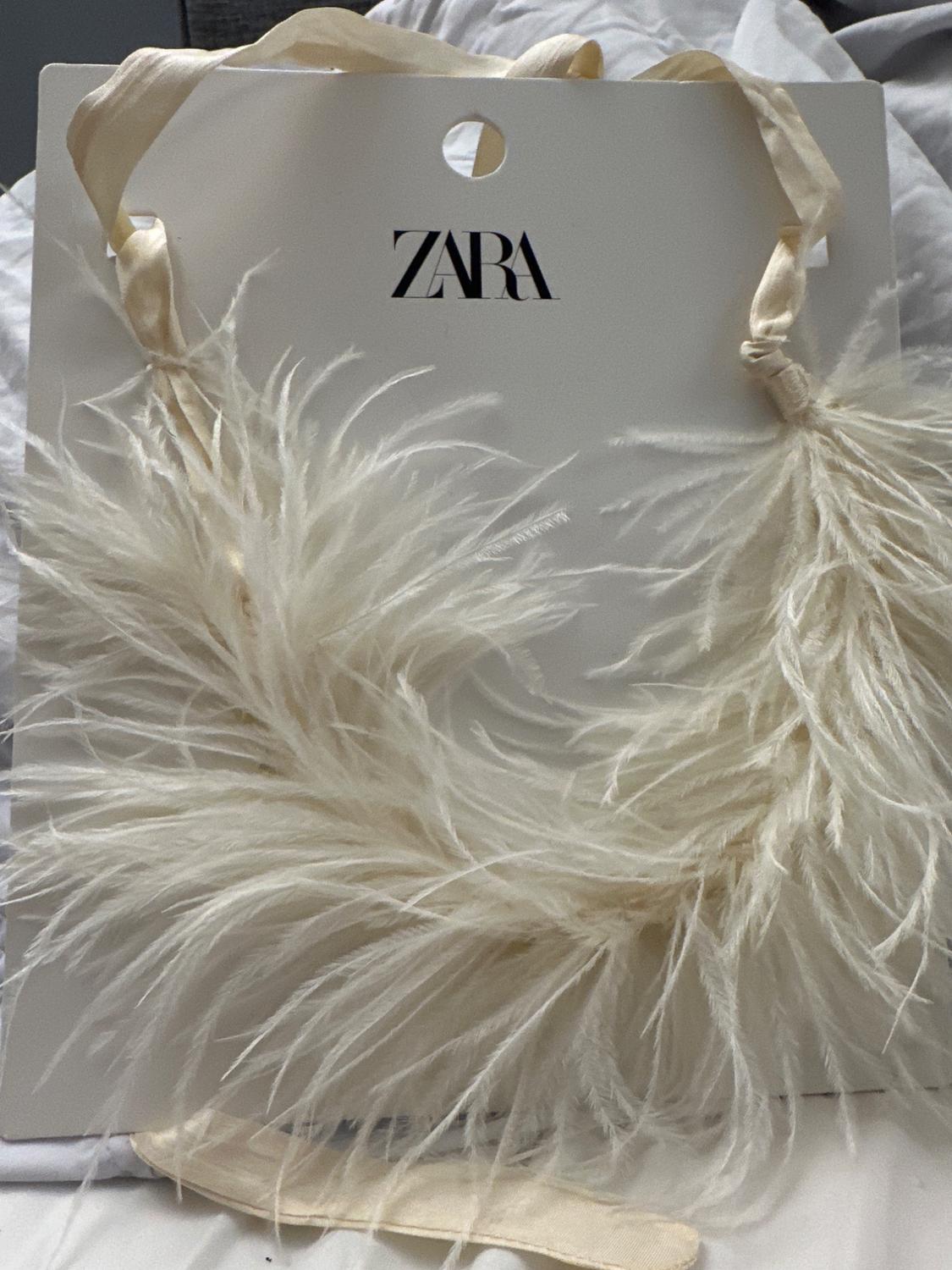 COLLAR PLUMAS