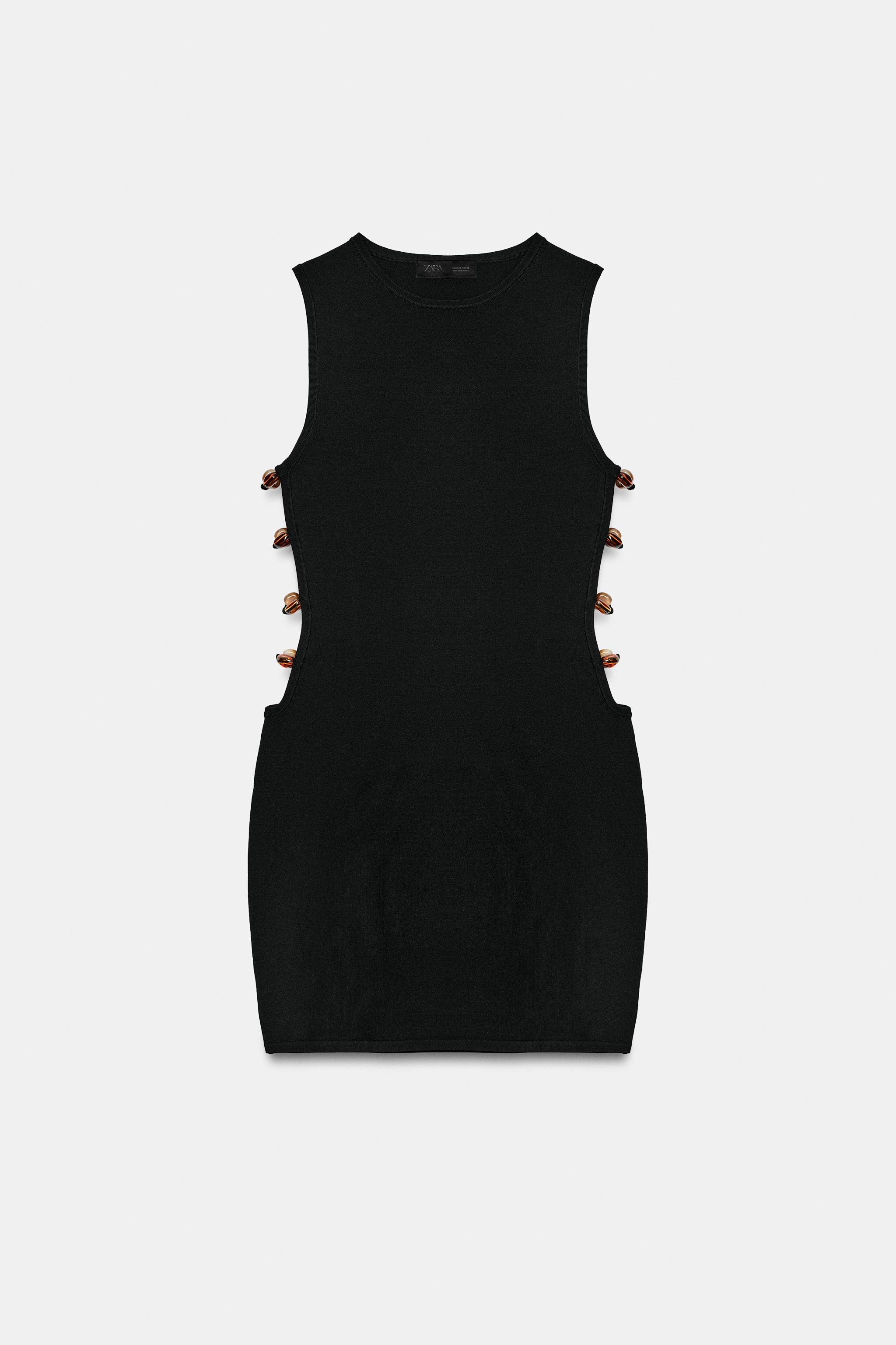 ROBE COURTE EN MAILLE À OUVERTURES FANTAISIE