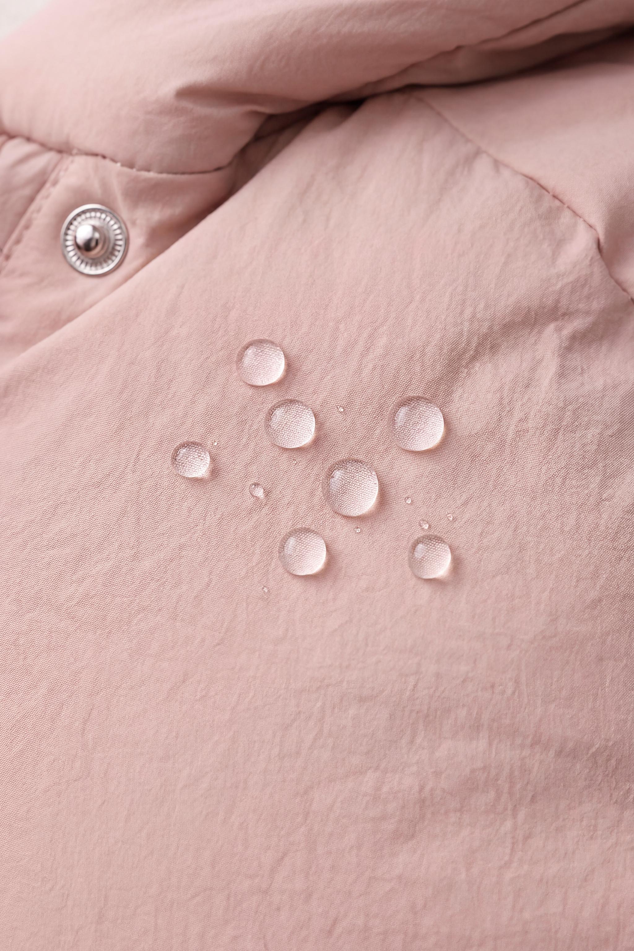 MANTEAU MATELASSÉ DÉPERLANT À NŒUDS