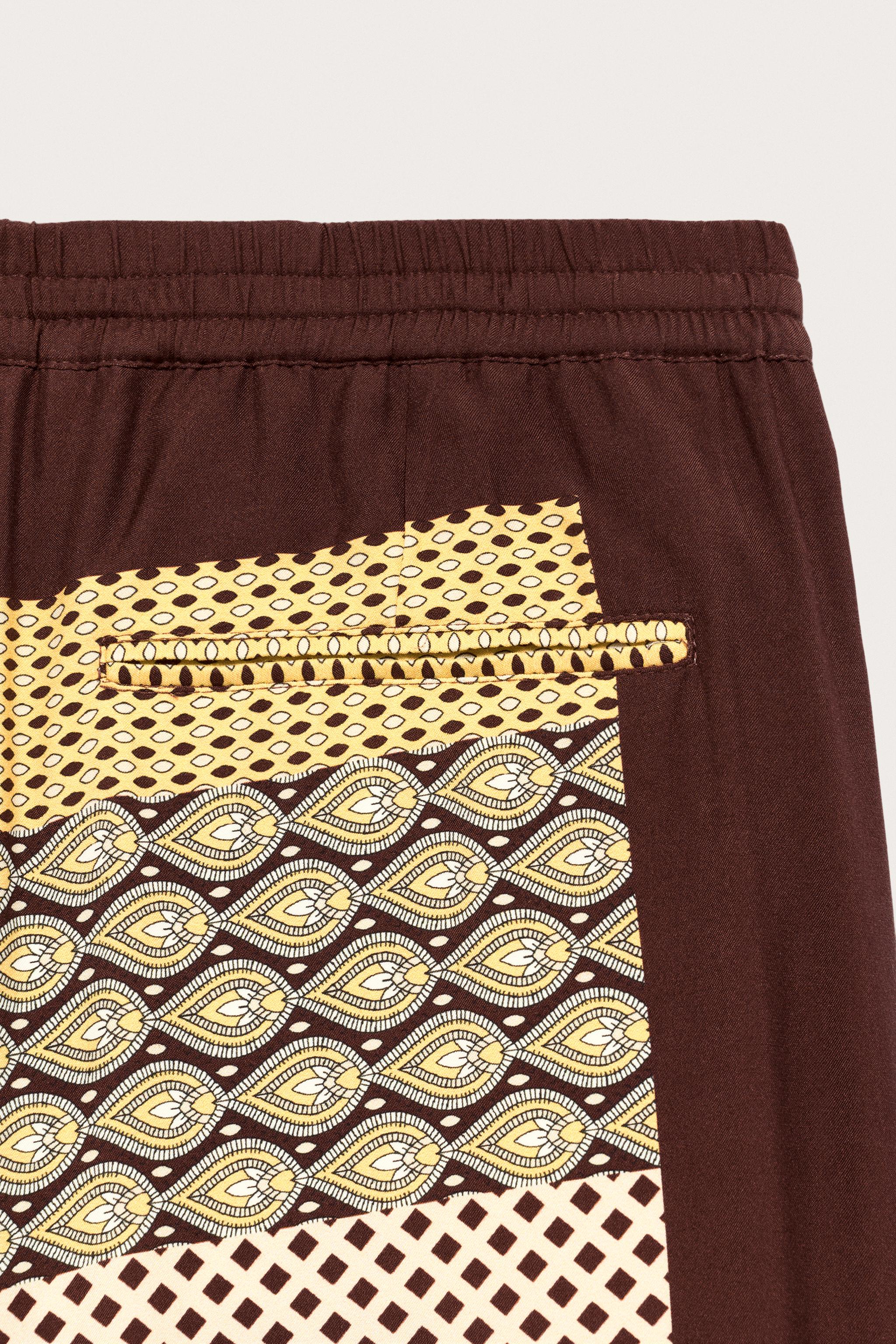 LIMITED EDITION MIXED PRINT FLOWY PANTS