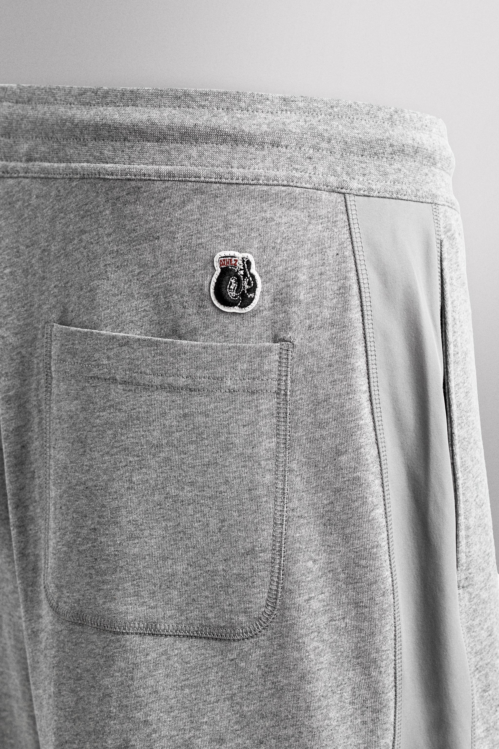 EMBROIDERED SIDE STRIPE 9" SHORTS