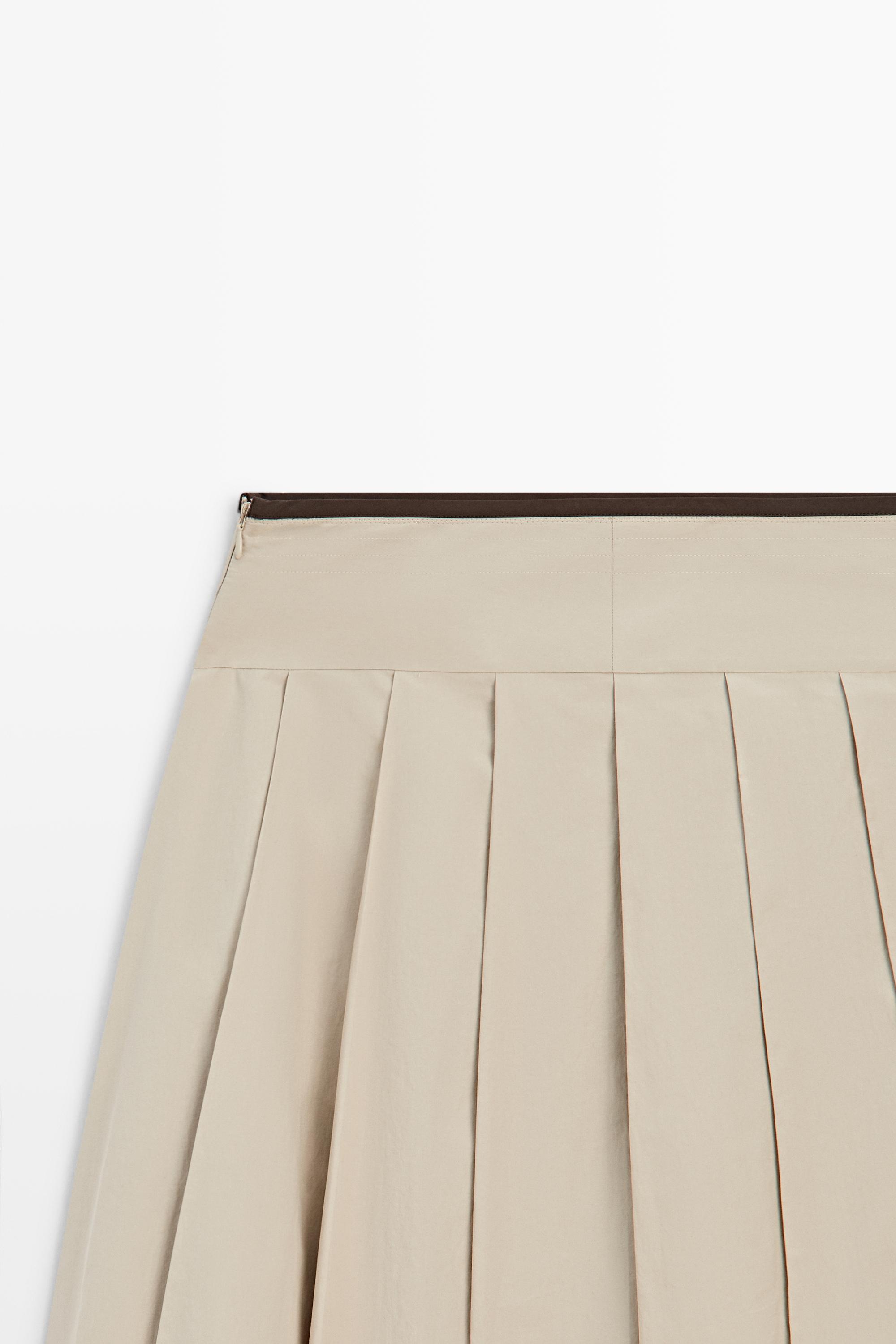 Pleated midi skirt with contrasting sash