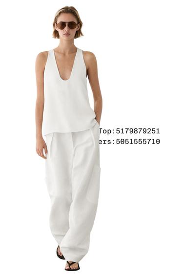 Top fluido escote pico - Blanco roto de Zara