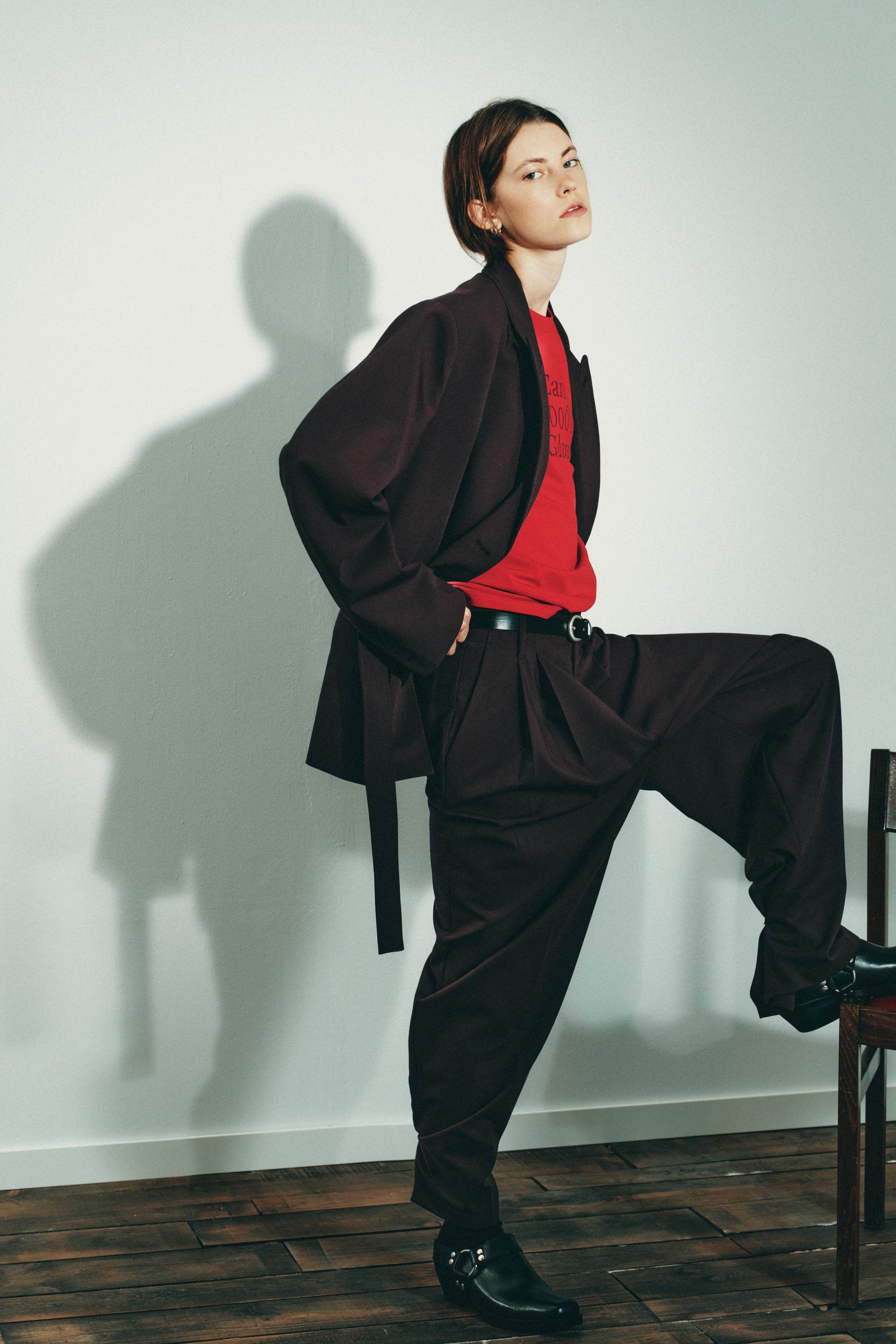 PLEATED PANTS WITH BUTTON HEM