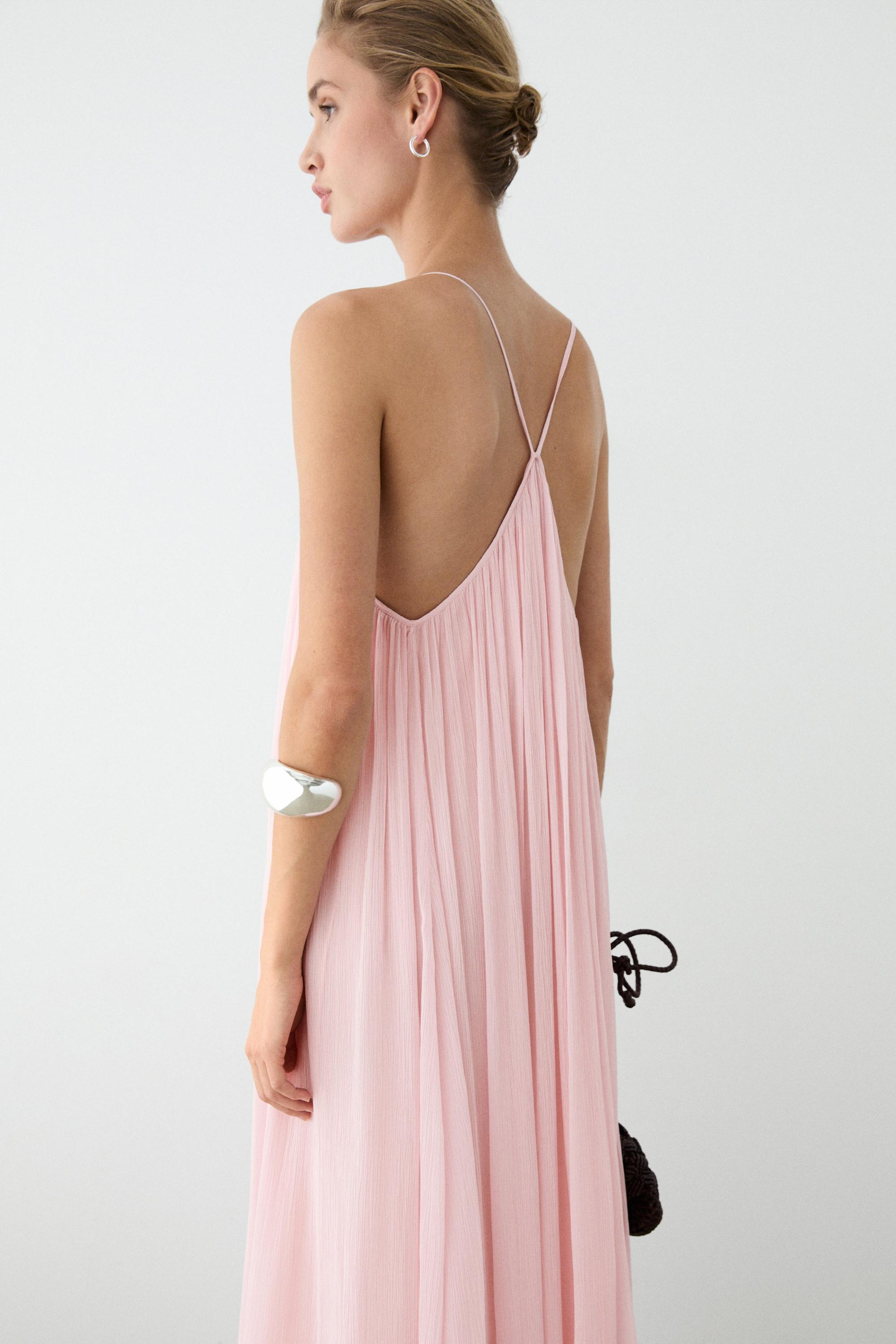 Flowing pleated spaghetti strap dress