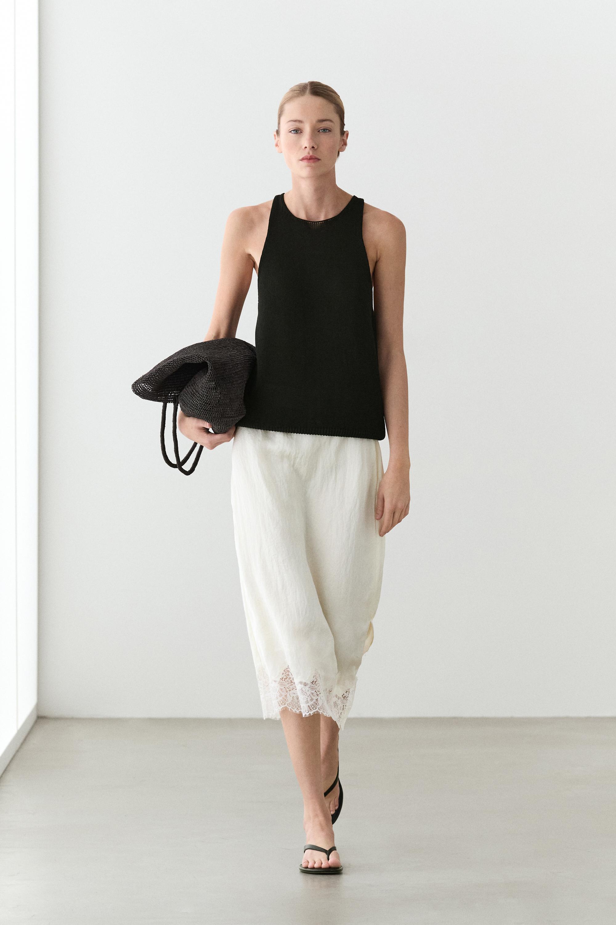 Flowing midi skirt with lace detail — White