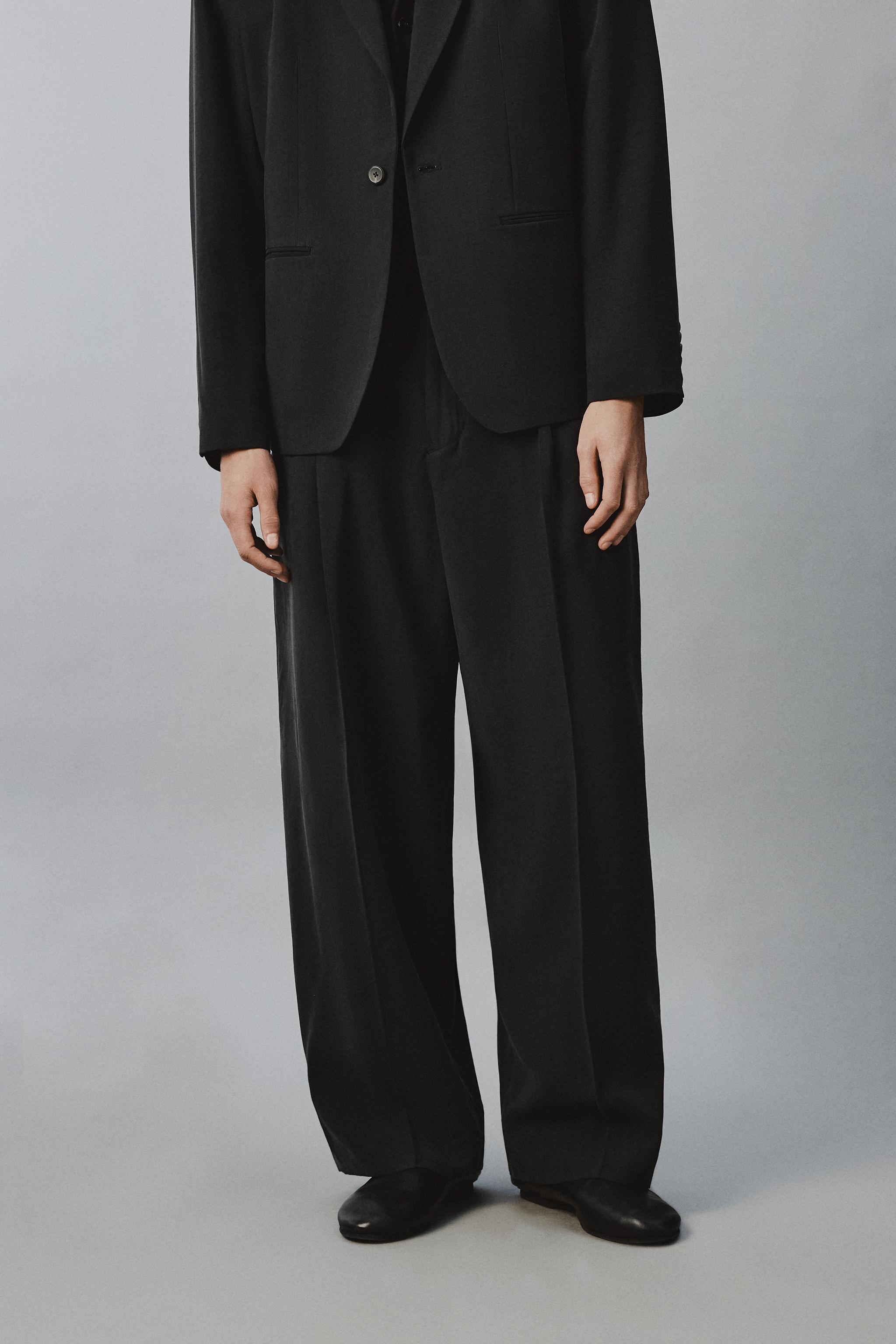 RELAXED FIT FLOWY PANTS
