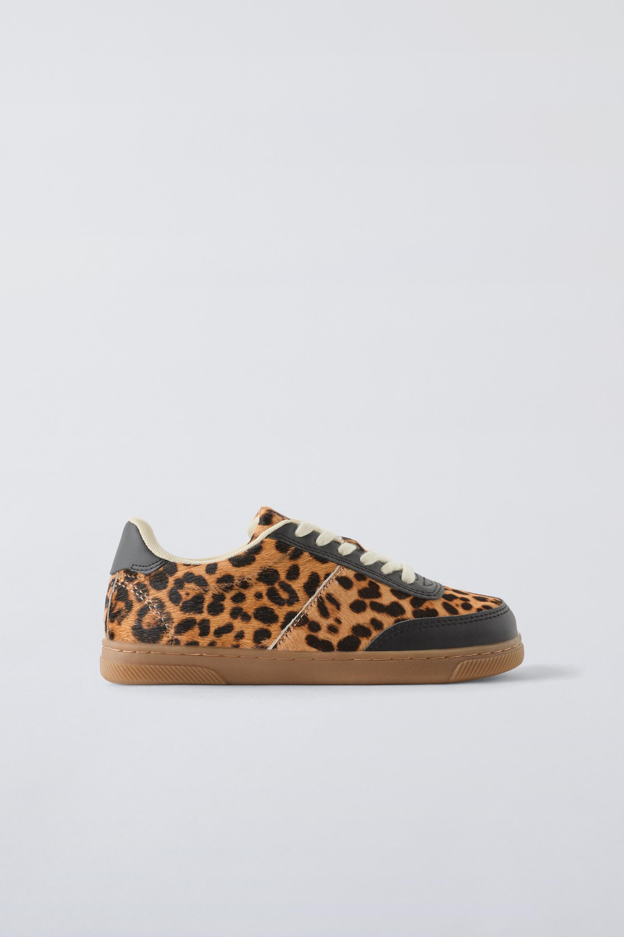 SNEAKER MIT ANIMAL PRINT