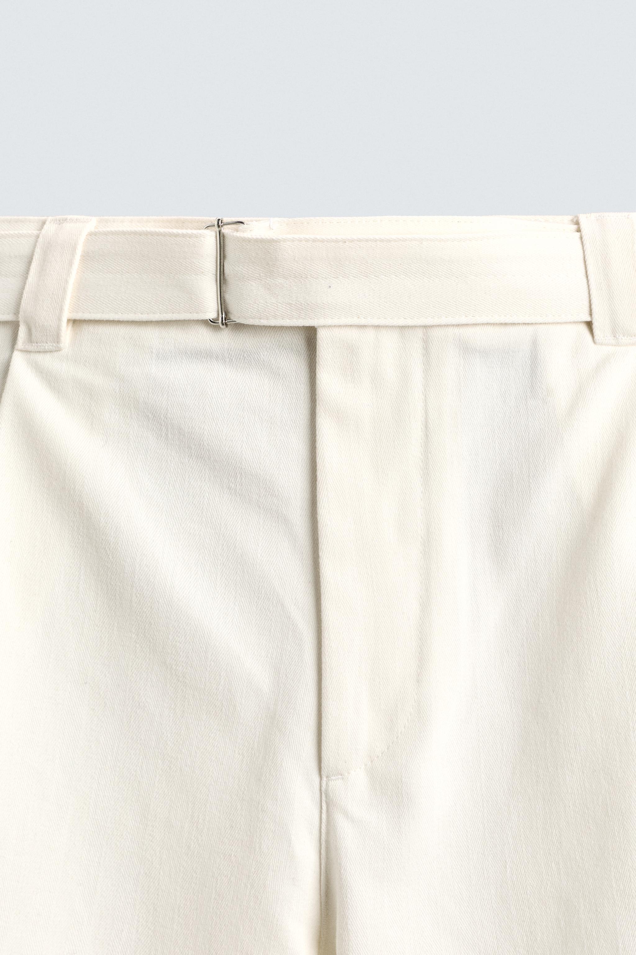 RELAXED FIT PLEATED BELTED SHORTS