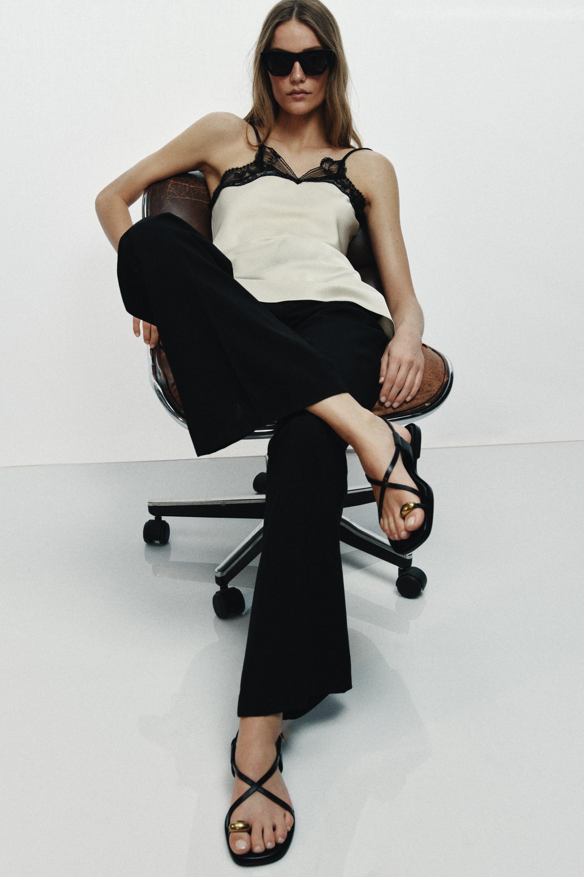 FLAT SANDALS WITH METALLIC DETAIL