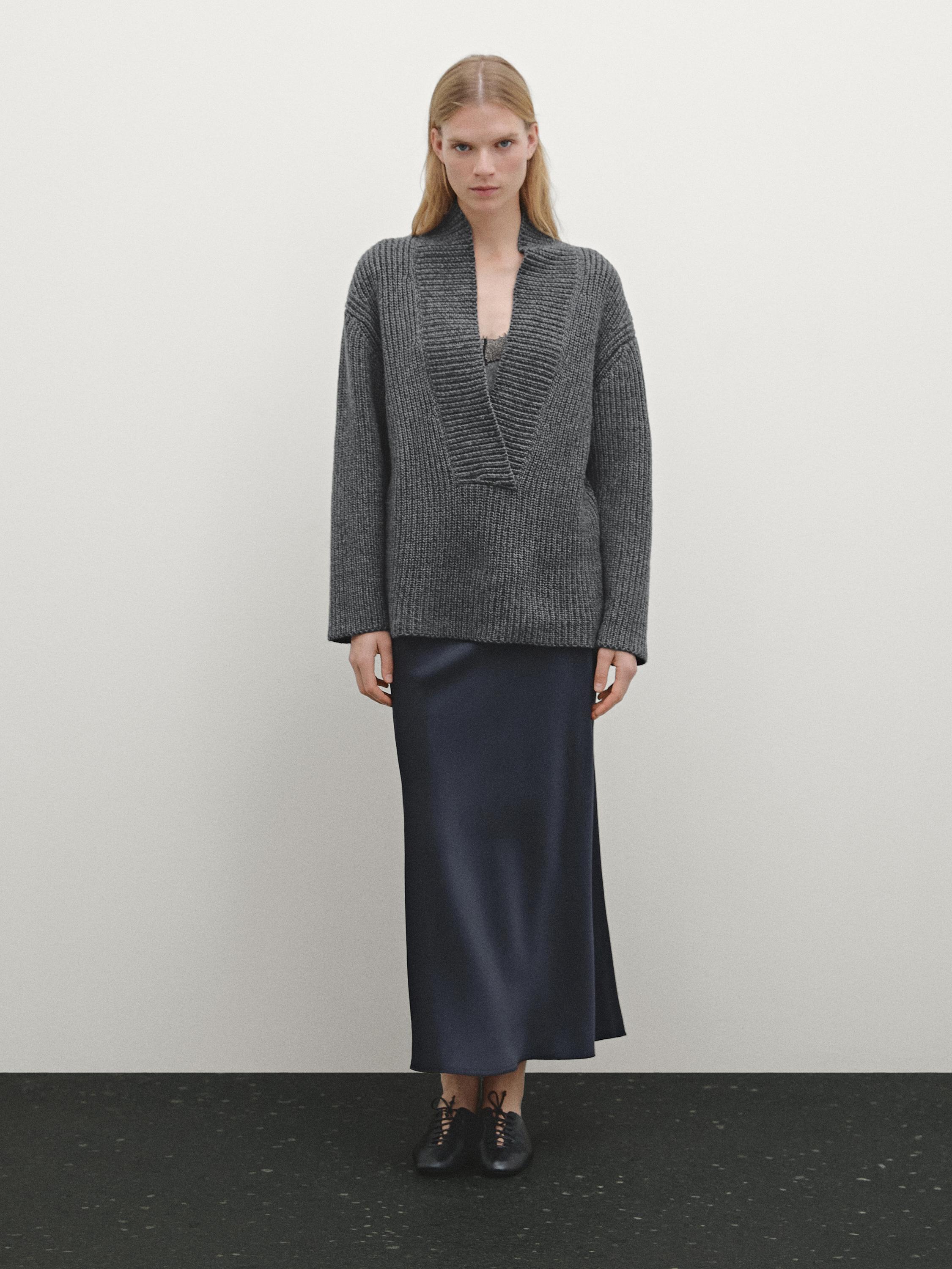 Pull en maille perlée à col effiloché