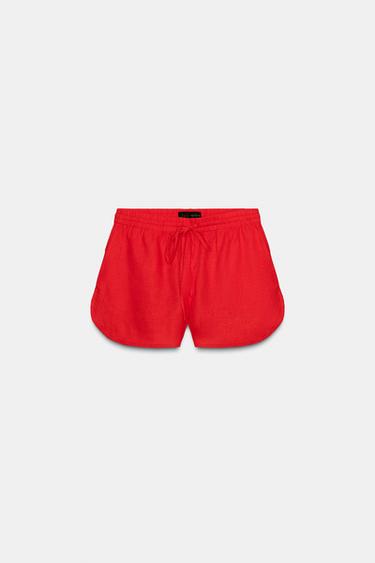 SHORTS CON LINO ABERTURAS - Coral fuerte de Zara