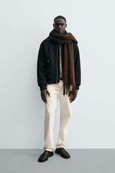 PANTALÓN REGULAR FIT ESTRUCTURA - Blanco de Zara - Imagen 0