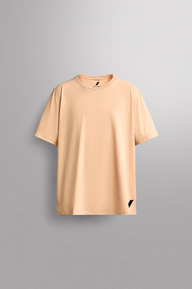PLAYERA TÉCNICA BÁSICA - Naranja de Zara