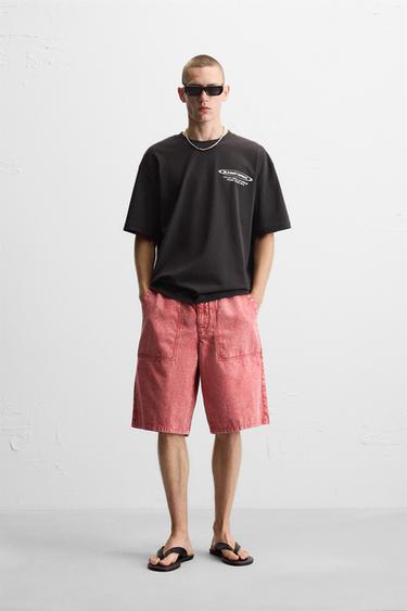 تي شيرت بطباعة نصوص - أسود الخاص بـ Zara